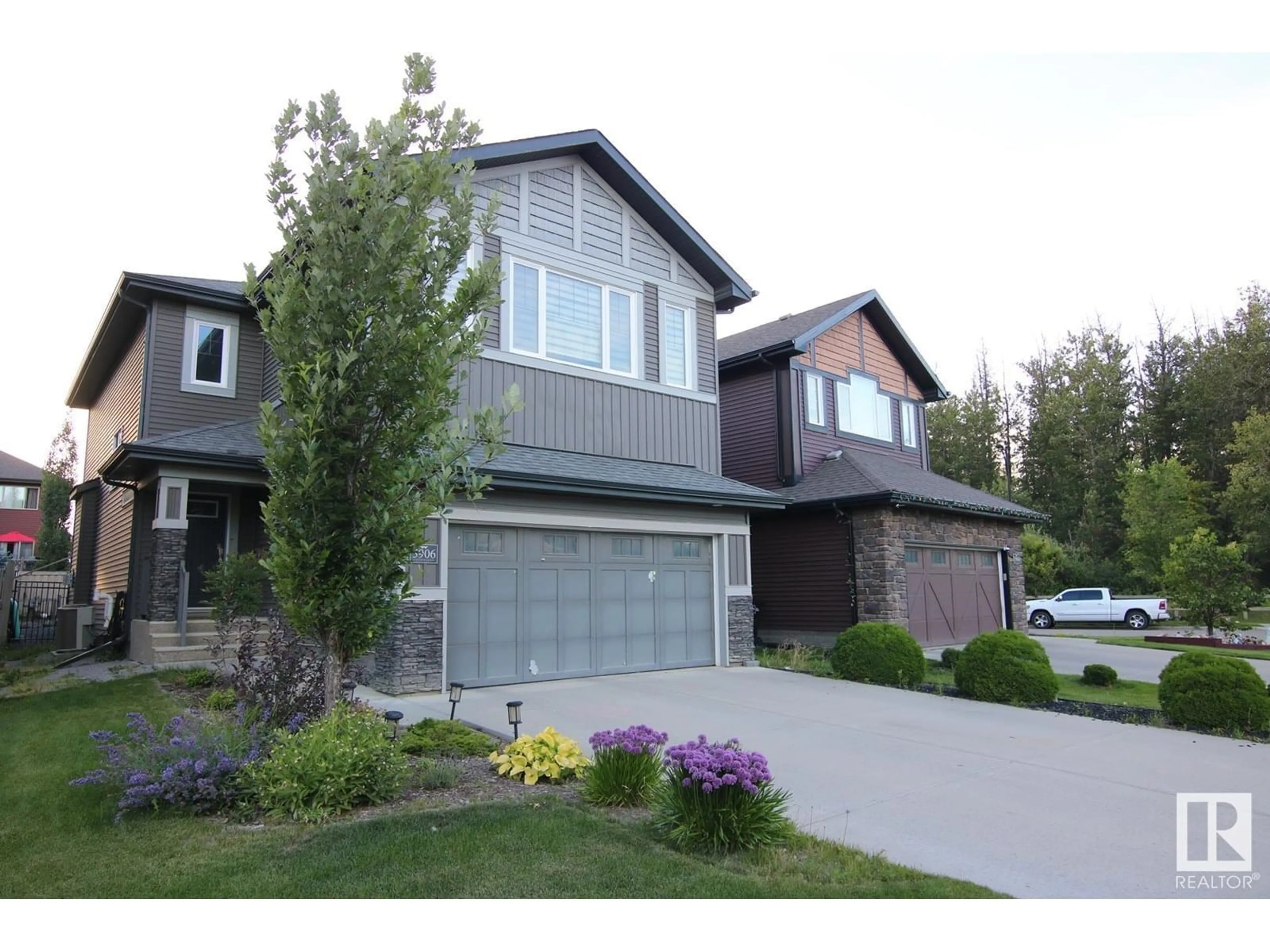 Home with vinyl exterior material, street for 5906 EDMONDS CR, Edmonton Alberta T6M0N9