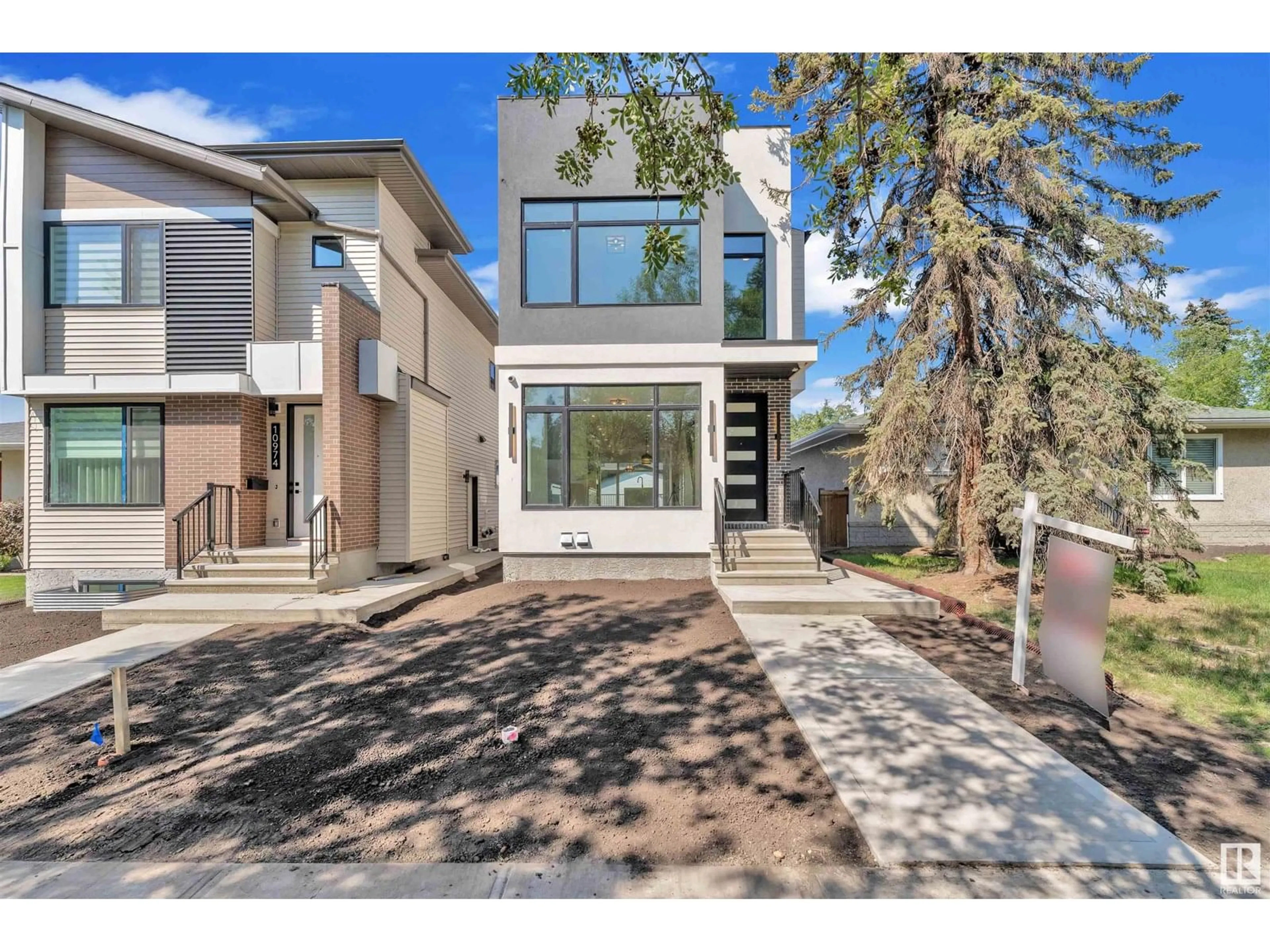 Home with brick exterior material, street for NW - 10976 138 ST, Edmonton Alberta T5M1P2