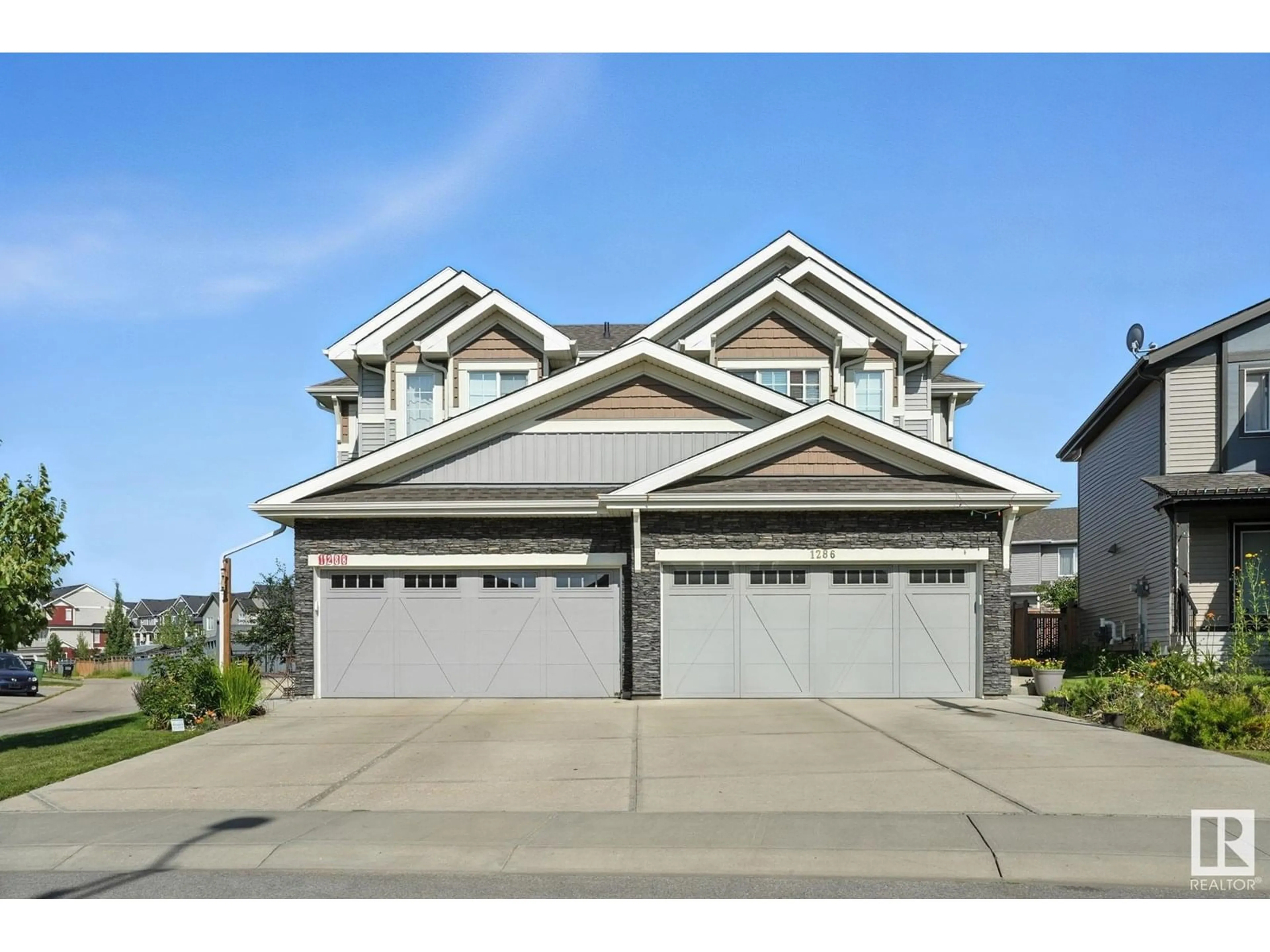 Home with vinyl exterior material, street for 1286 DANIELS CR, Edmonton Alberta T6W3J1