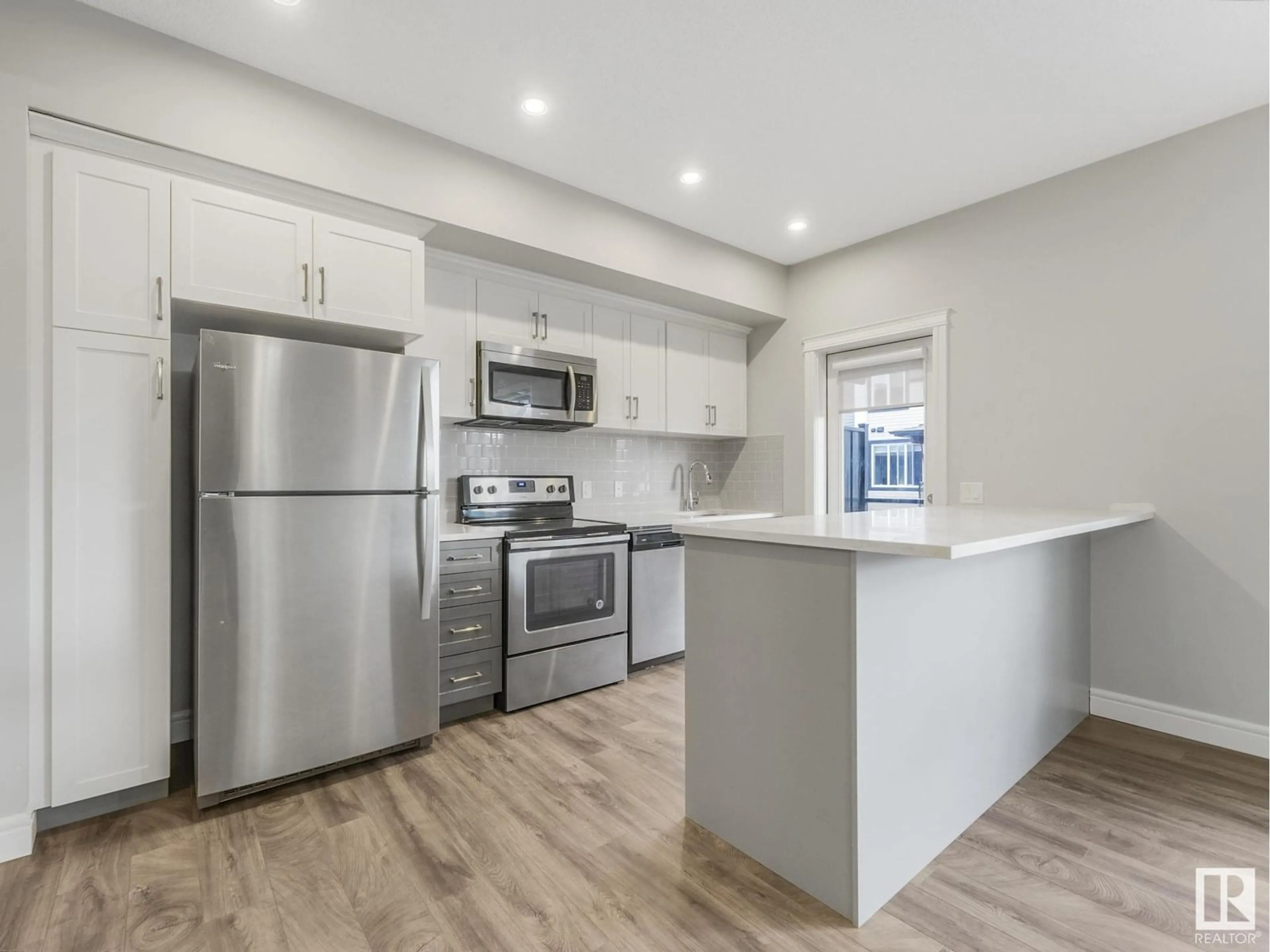 Open concept kitchen, unknown for #66 - 446 ALLARD BV, Edmonton Alberta T6W3S7