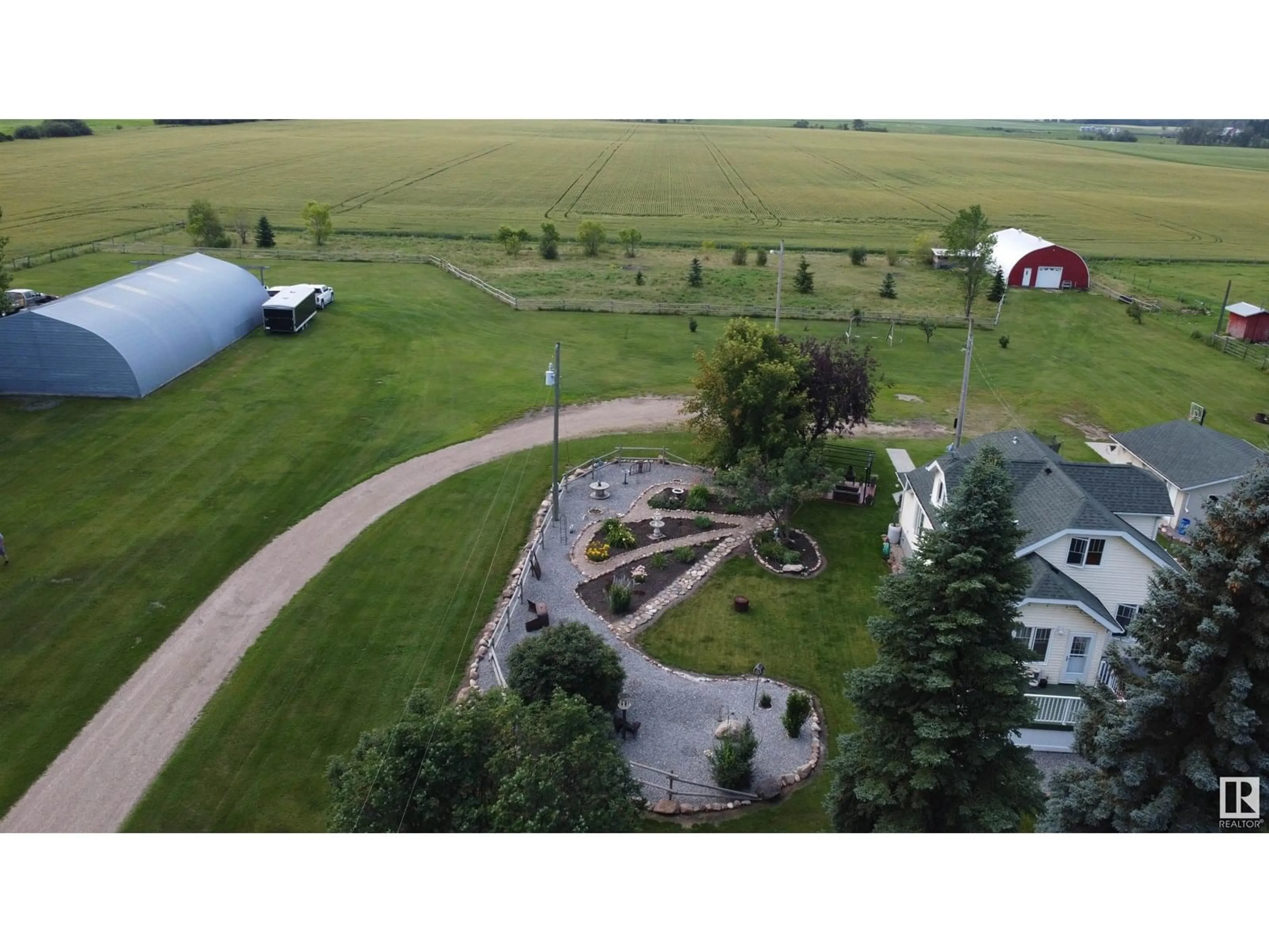 A pic from outside/outdoor area/front of a property/back of a property/a pic from drone, mountain view for 26449 TWP RD 490, Rural Leduc County Alberta T0C0V0