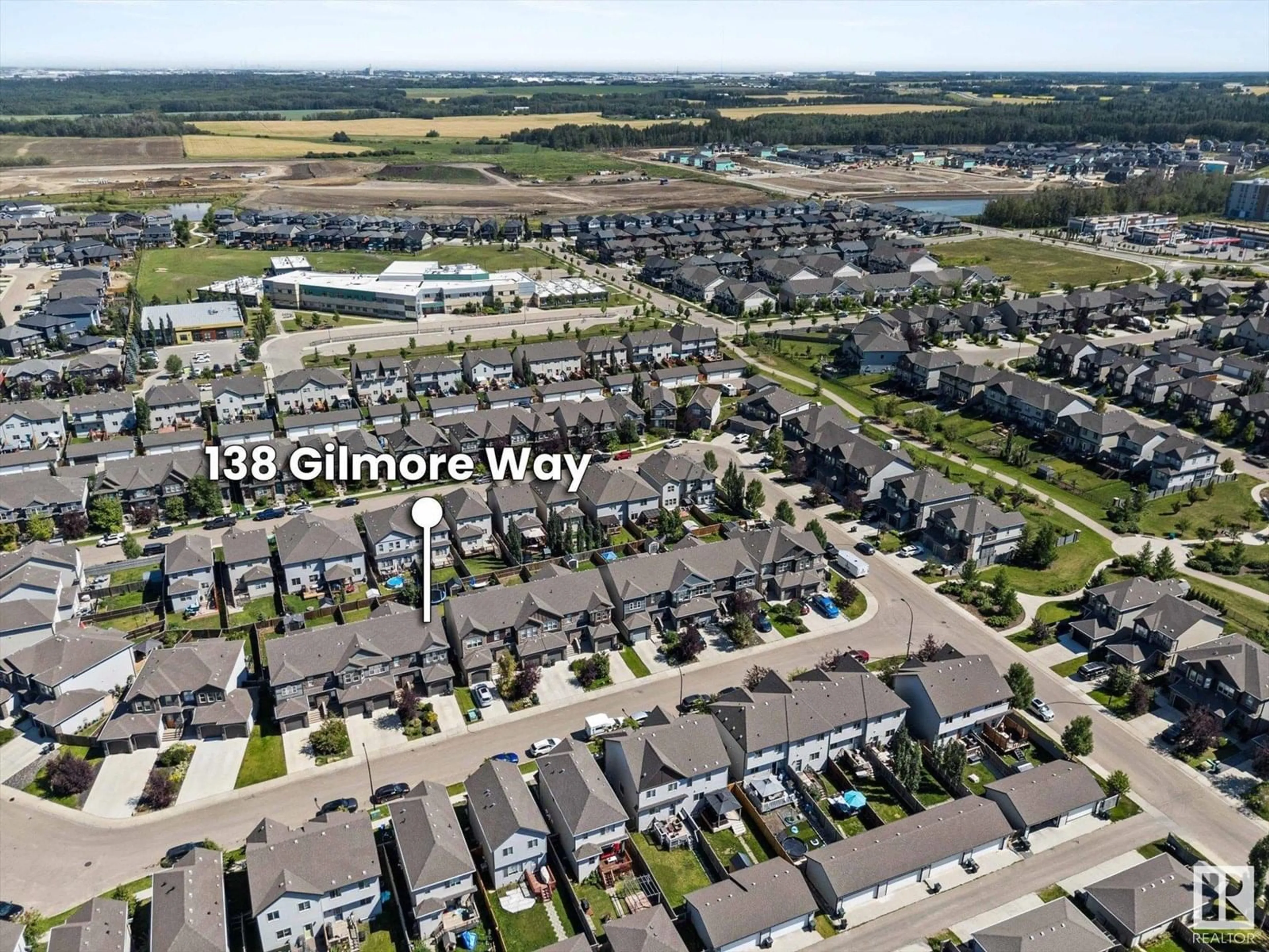 A pic from outside/outdoor area/front of a property/back of a property/a pic from drone, street for 138 GILMORE WY, Spruce Grove Alberta T7X0M5