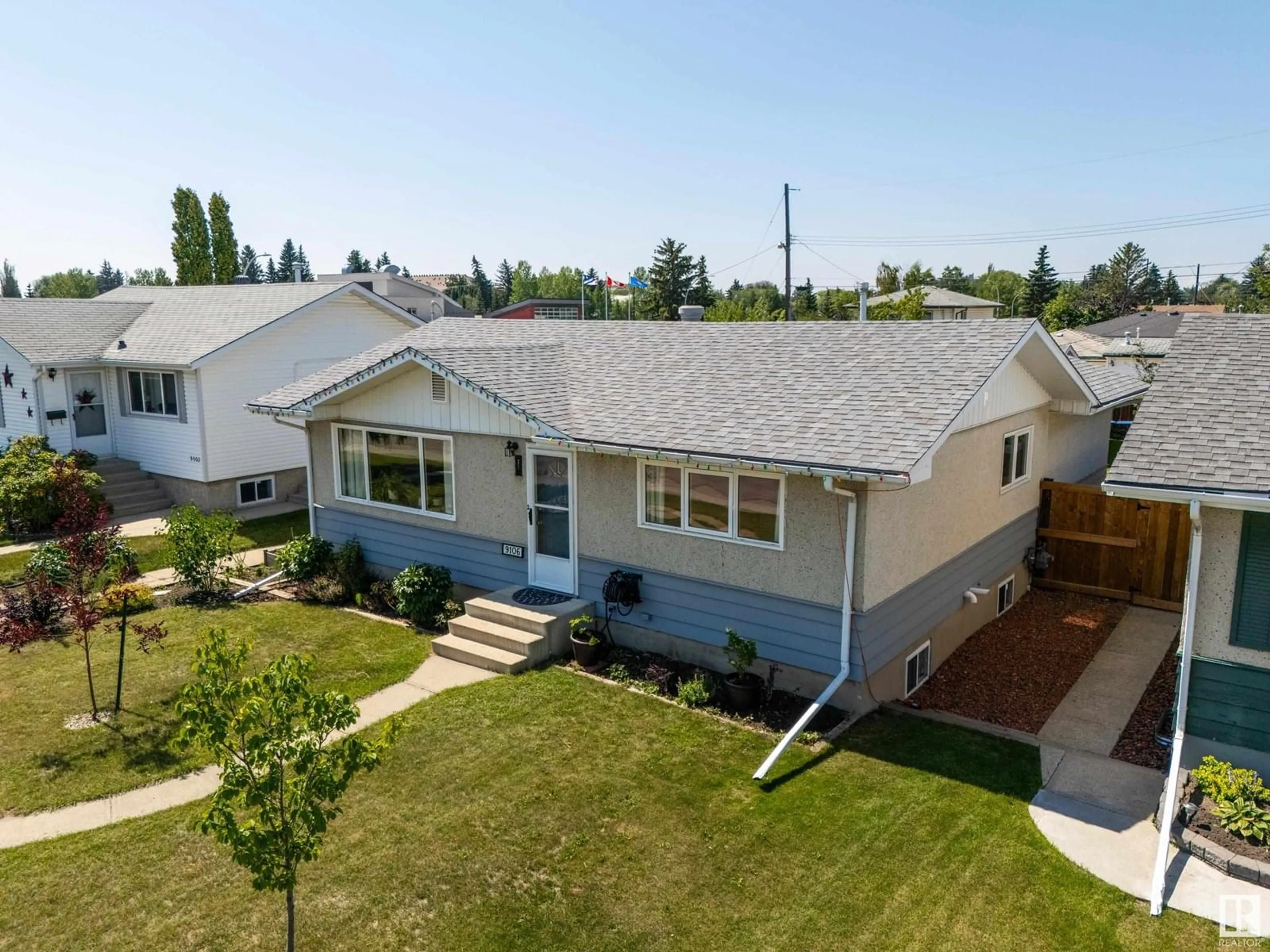 A pic from outside/outdoor area/front of a property/back of a property/a pic from drone, street for 9106 154 ST, Edmonton Alberta T5R1T3