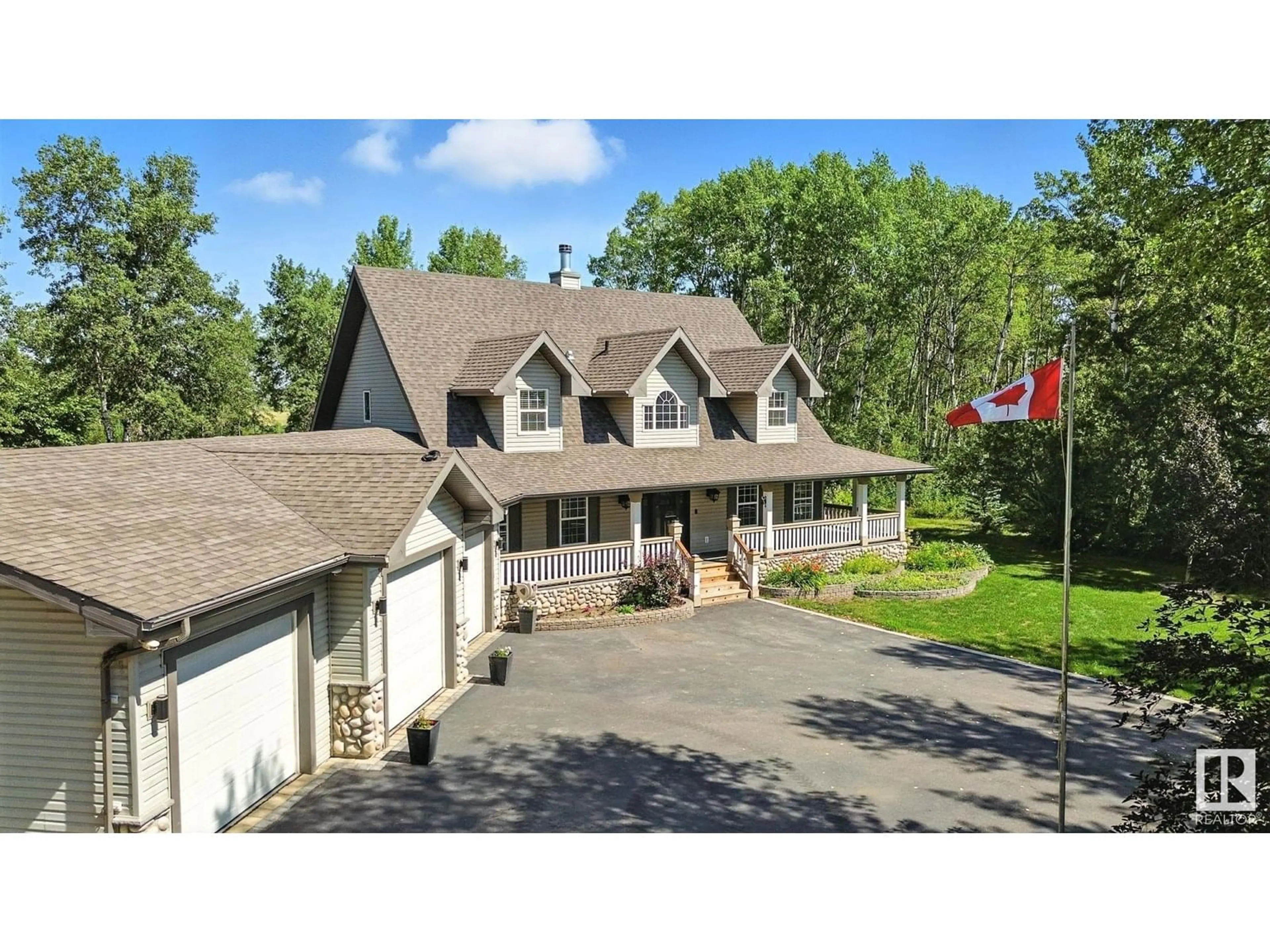 A pic from outside/outdoor area/front of a property/back of a property/a pic from drone, mountain view for 84 54519 RGE ROAD 272, Rural Sturgeon County Alberta T0G0J0
