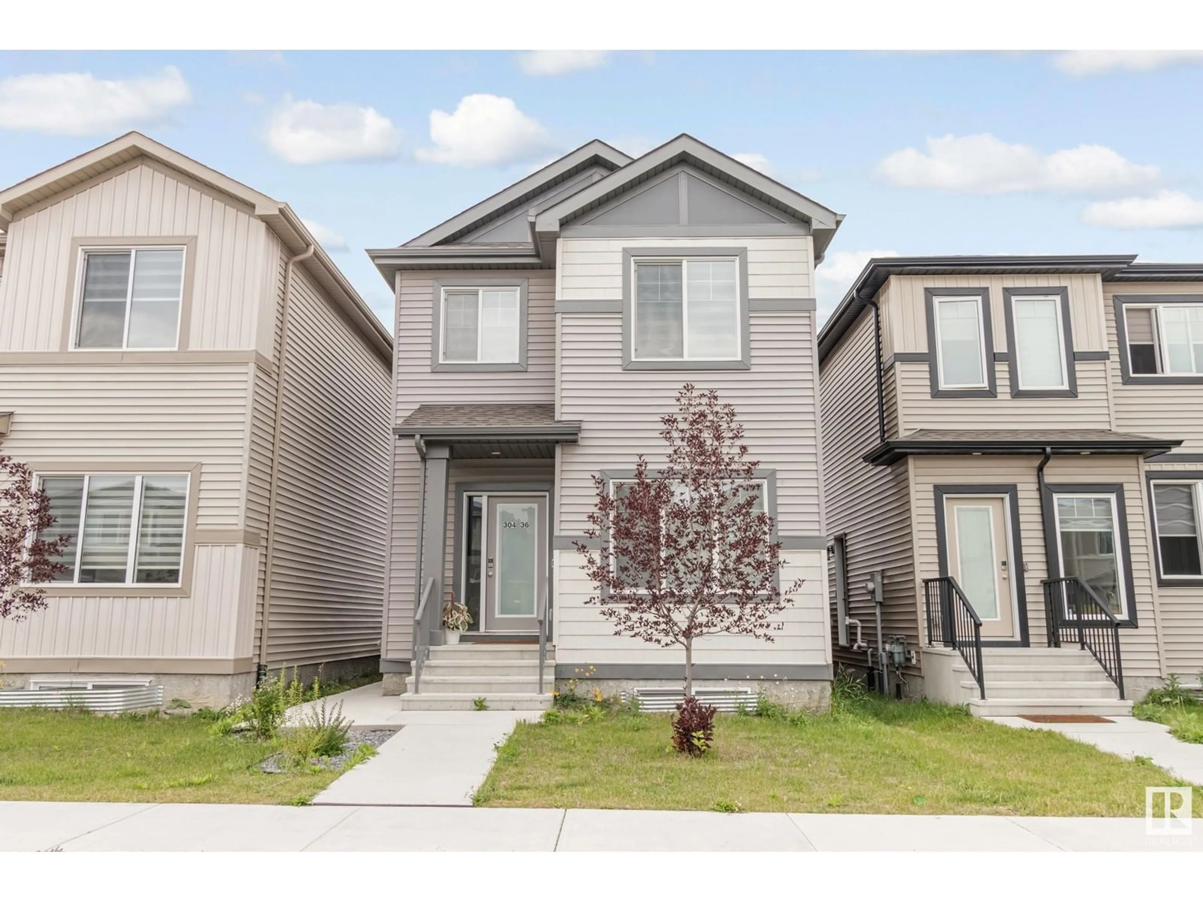 Home with vinyl exterior material, street for 304 36 AV, Edmonton Alberta T6T2P9