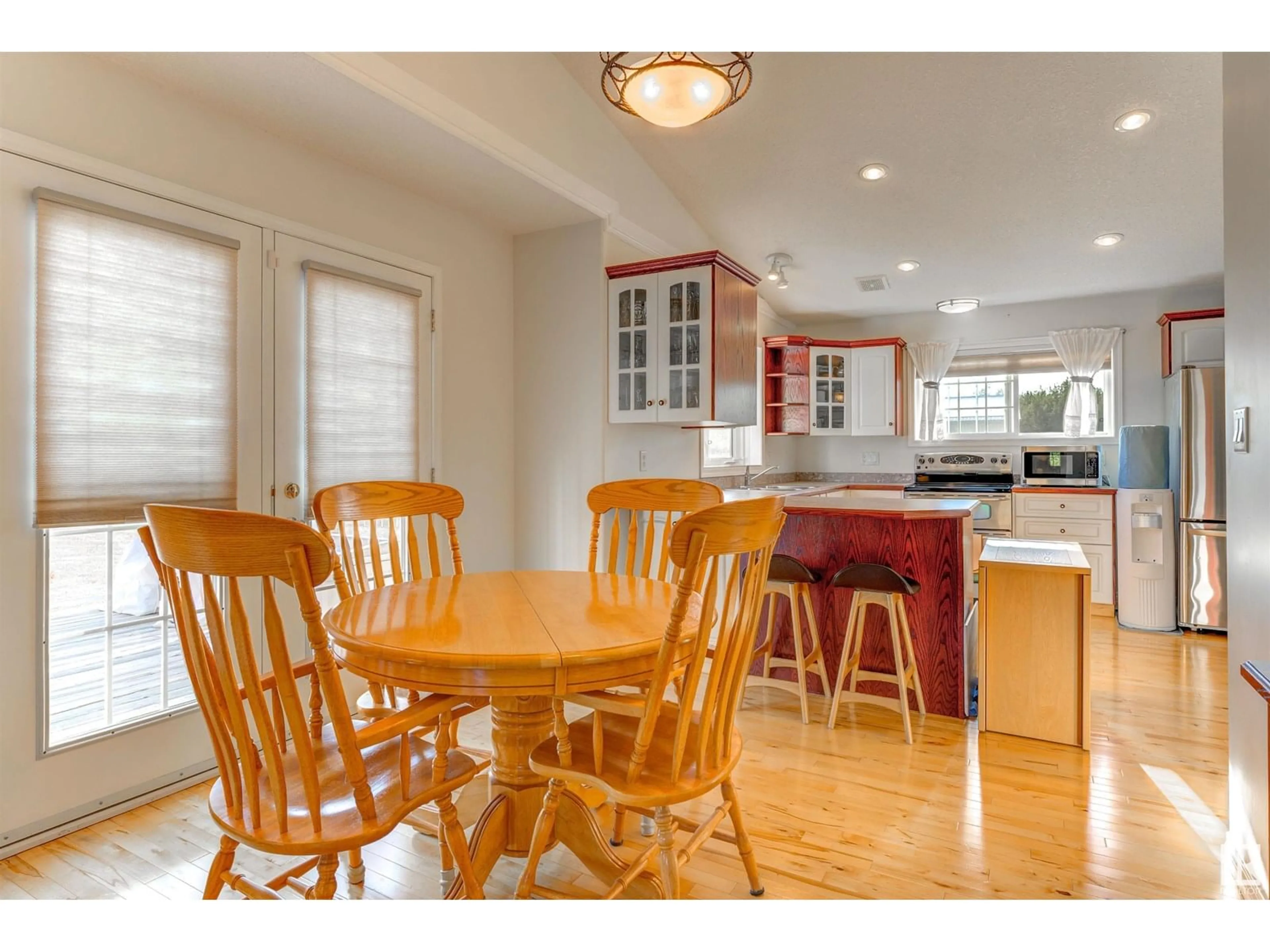Open concept kitchen, wood/laminate floor for 63319 - 28 RANGE ROAD 435, Rural Bonnyville M.D. Alberta T9M1P3