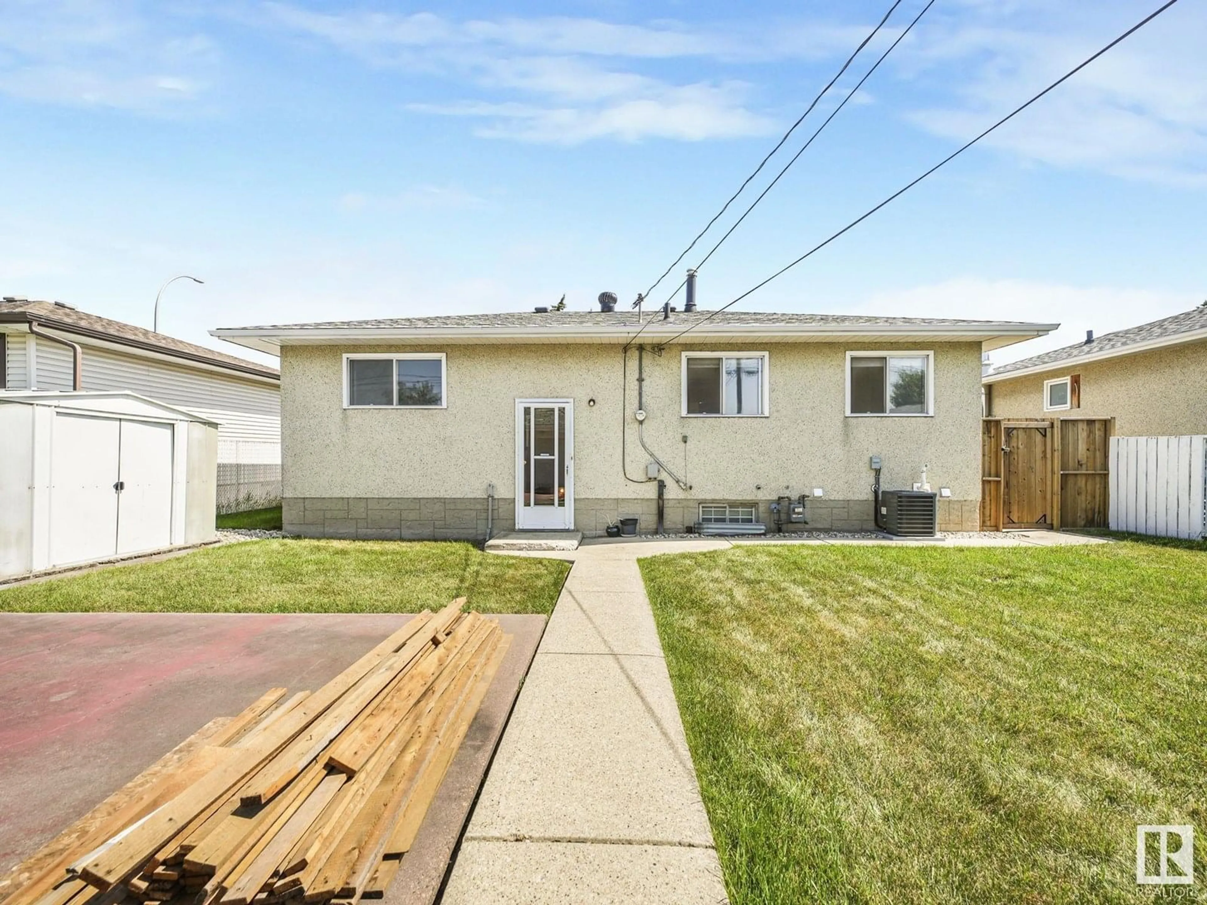 Home with vinyl exterior material, street for 13428 66 ST, Edmonton Alberta T5C0B6