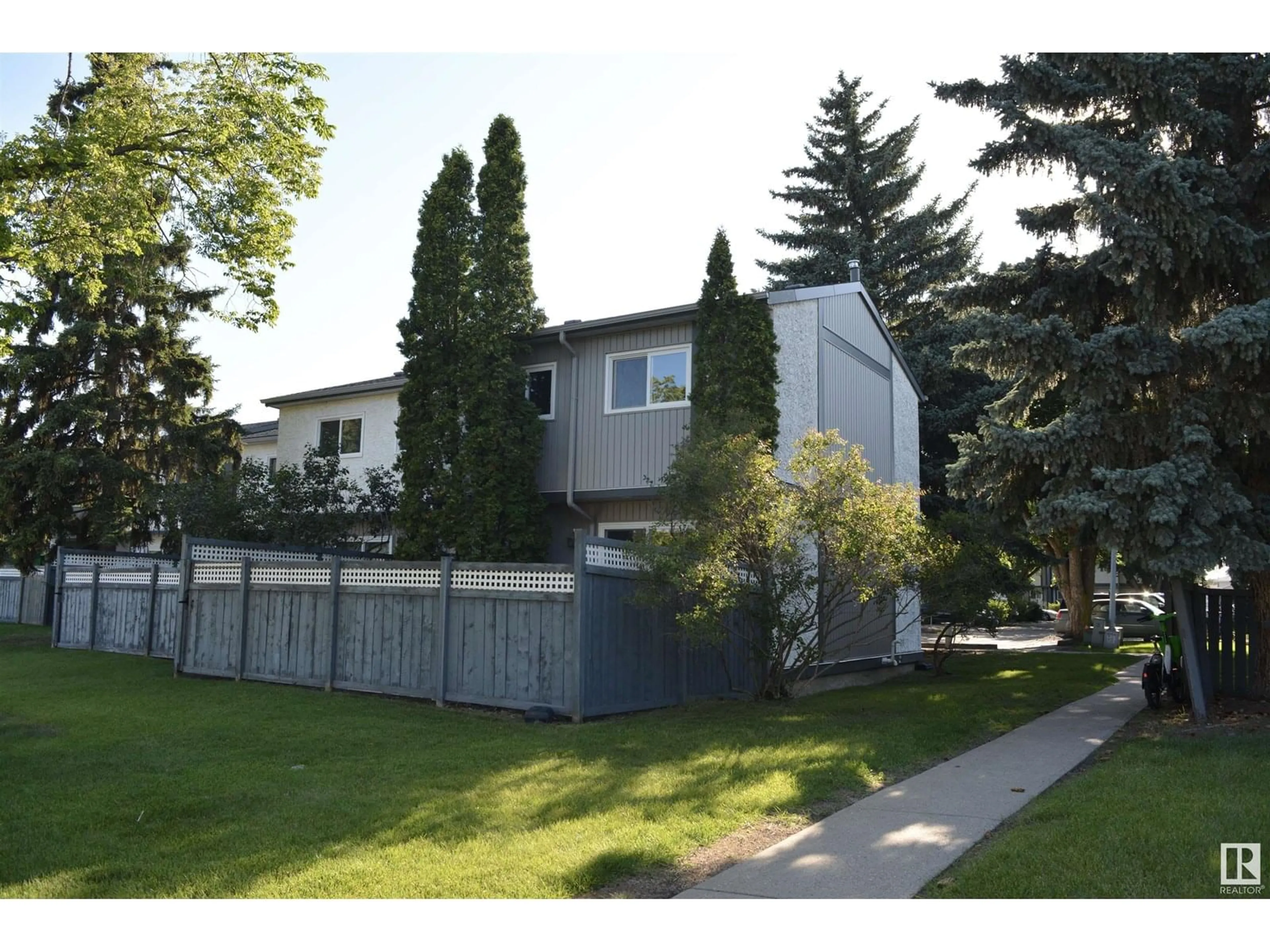Home with vinyl exterior material, street for NW - 18418 62B AV, Edmonton Alberta T5T2N7