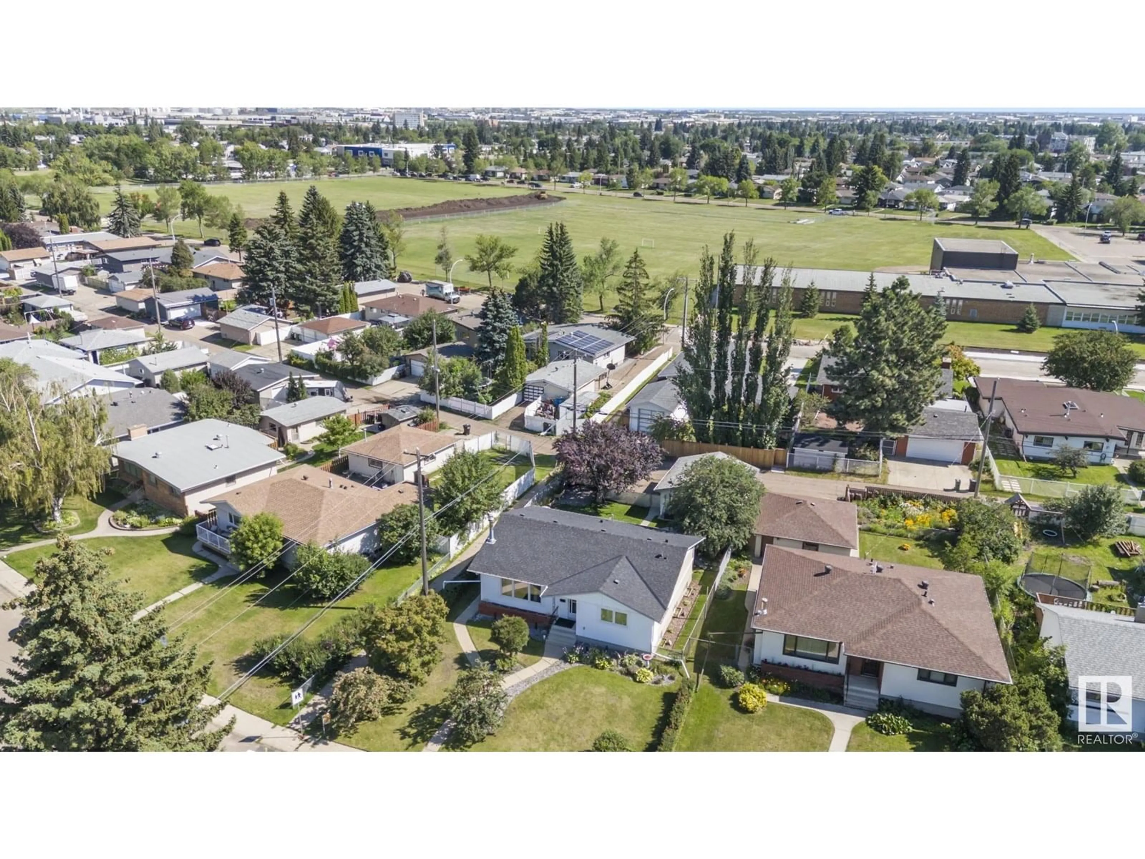 A pic from outside/outdoor area/front of a property/back of a property/a pic from drone, street for 6607 94A AV, Edmonton Alberta T6B0Y9