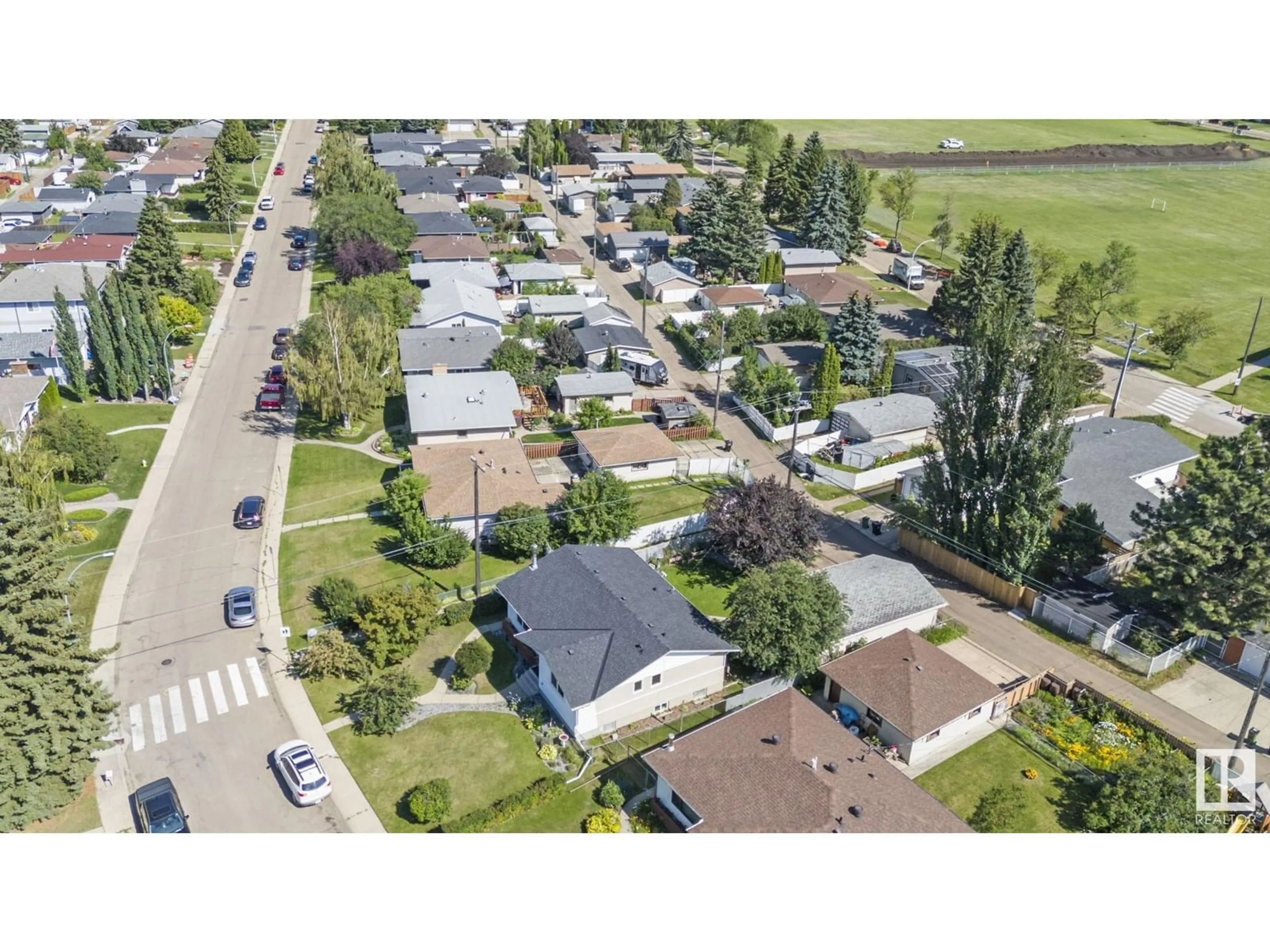 A pic from outside/outdoor area/front of a property/back of a property/a pic from drone, street for 6607 94A AV, Edmonton Alberta T6B0Y9