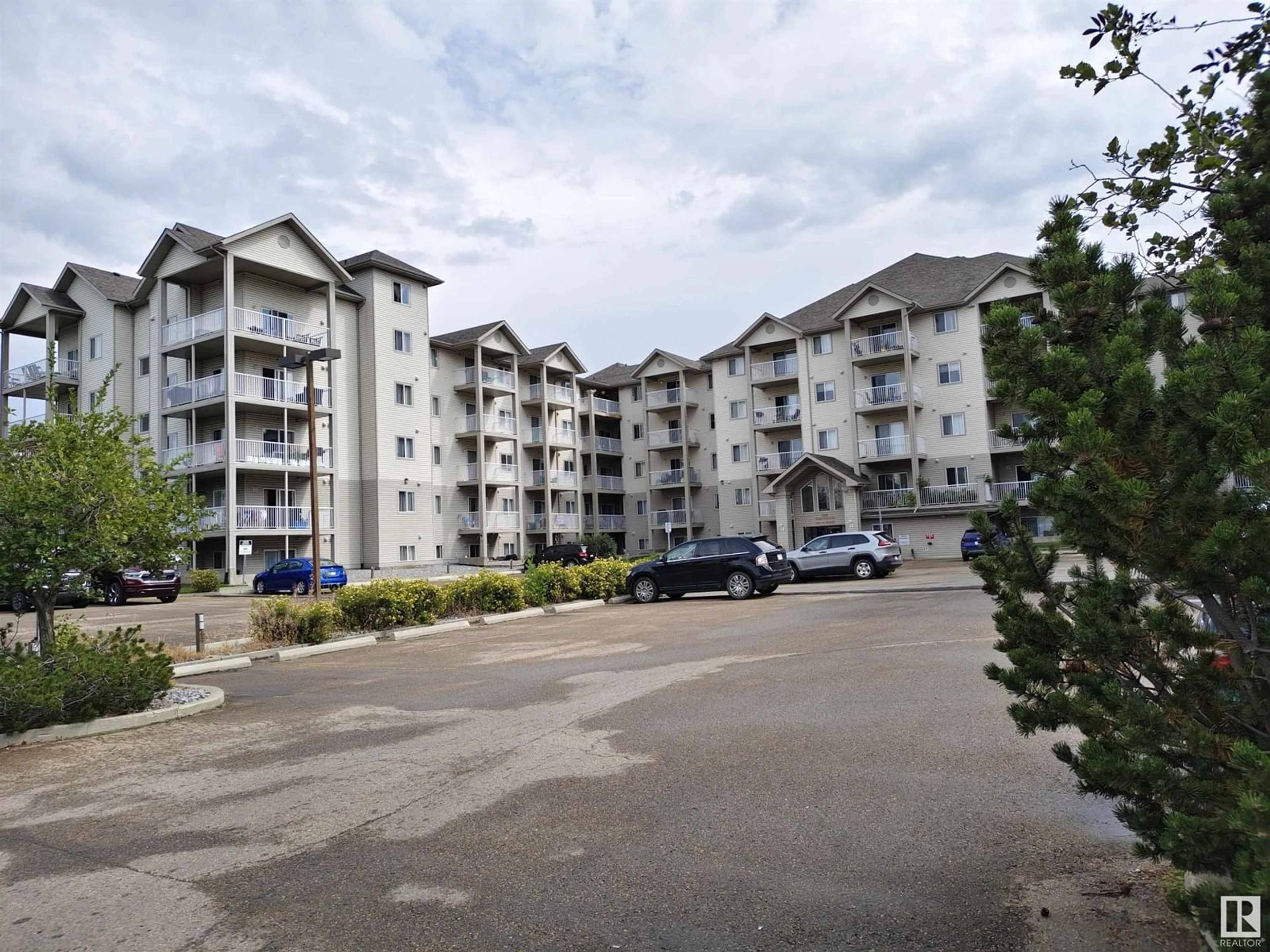 A pic from outside/outdoor area/front of a property/back of a property/a pic from drone, unknown for 209 - 7511 171 ST, Edmonton Alberta T5T6S7