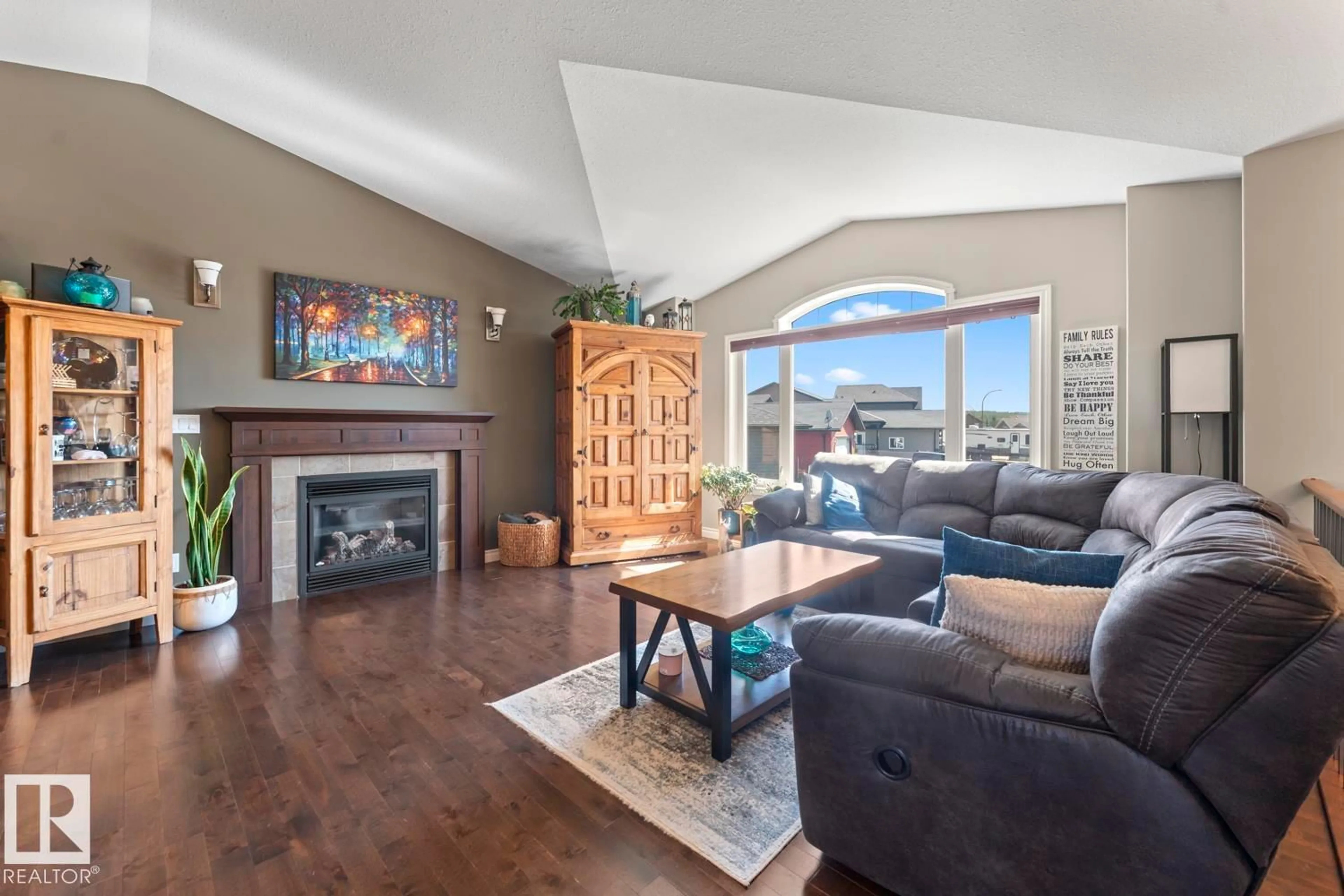 Living room with furniture, wood/laminate floor for 4918 60 AV, Cold Lake Alberta T9M0C2