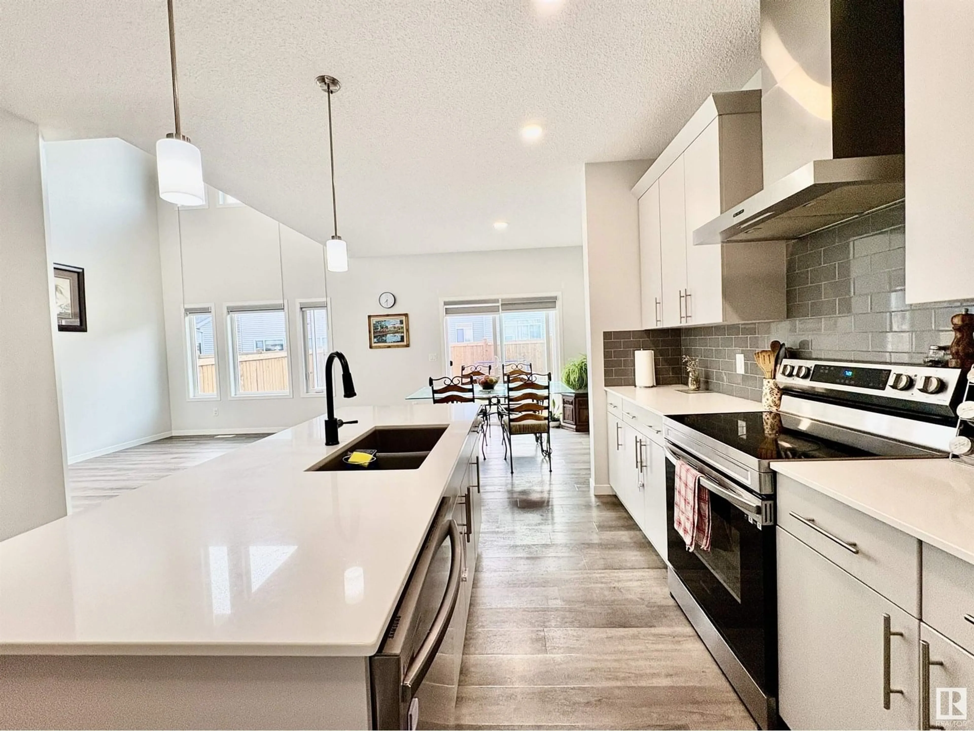 Open concept kitchen, ceramic/tile floor for 2712 194 ST, Edmonton Alberta T6M1K9