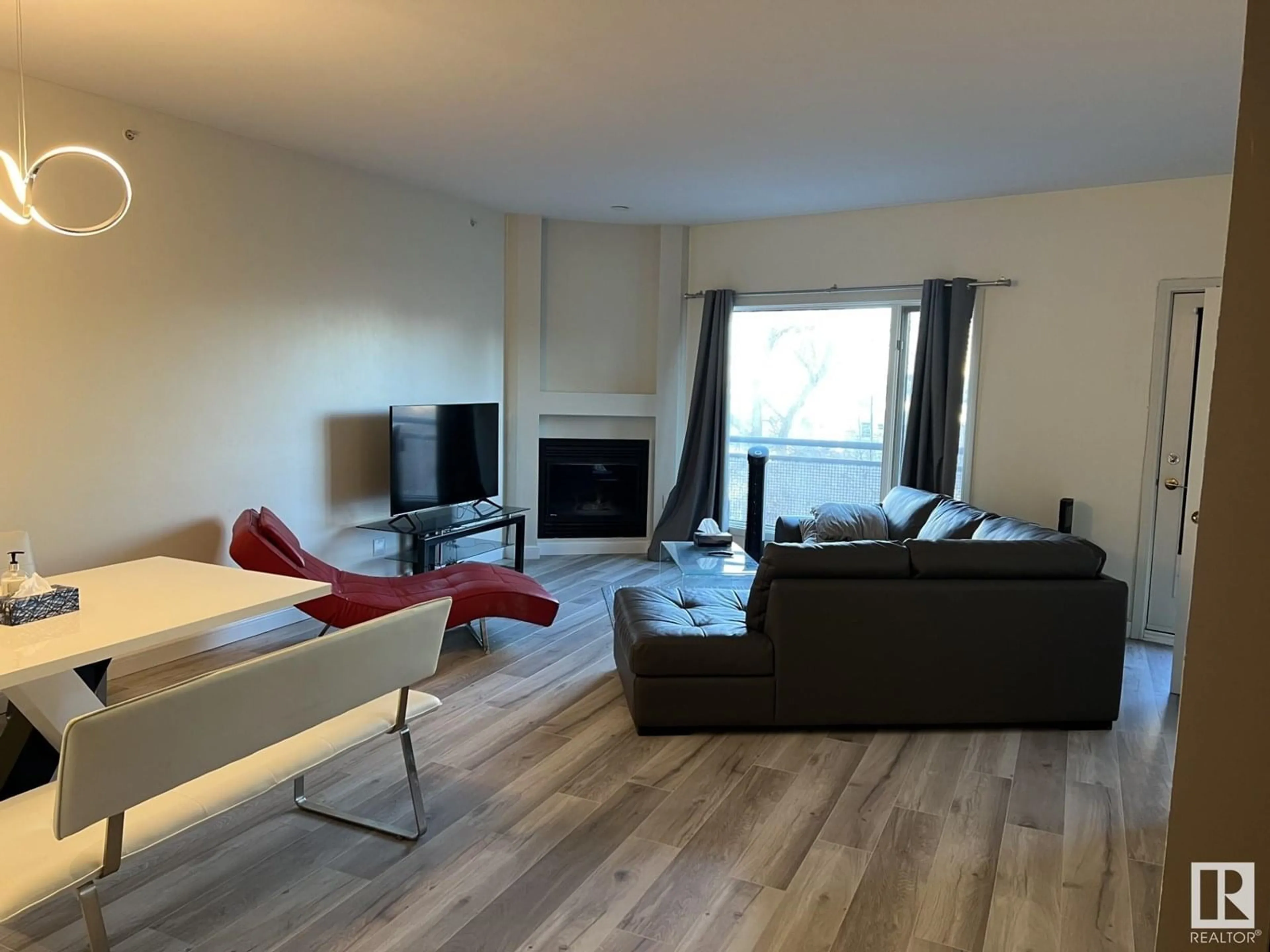 Living room with furniture, wood/laminate floor for #405 - 11415 100 AV, Edmonton Alberta T5K0J5