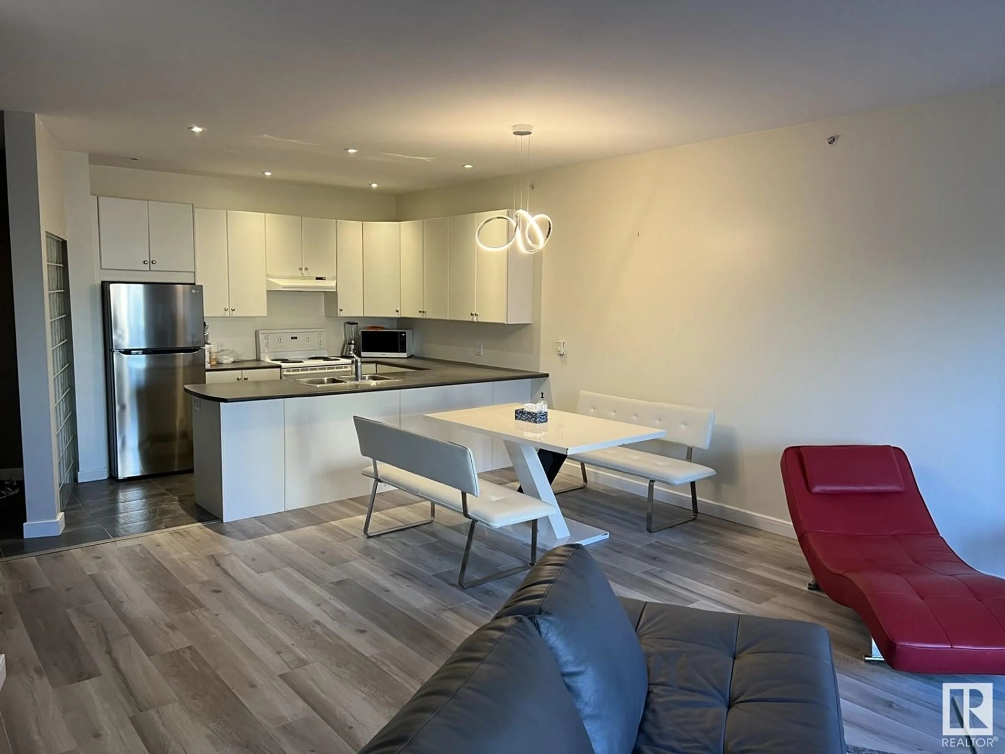 Open concept kitchen, wood/laminate floor for #405 - 11415 100 AV, Edmonton Alberta T5K0J5