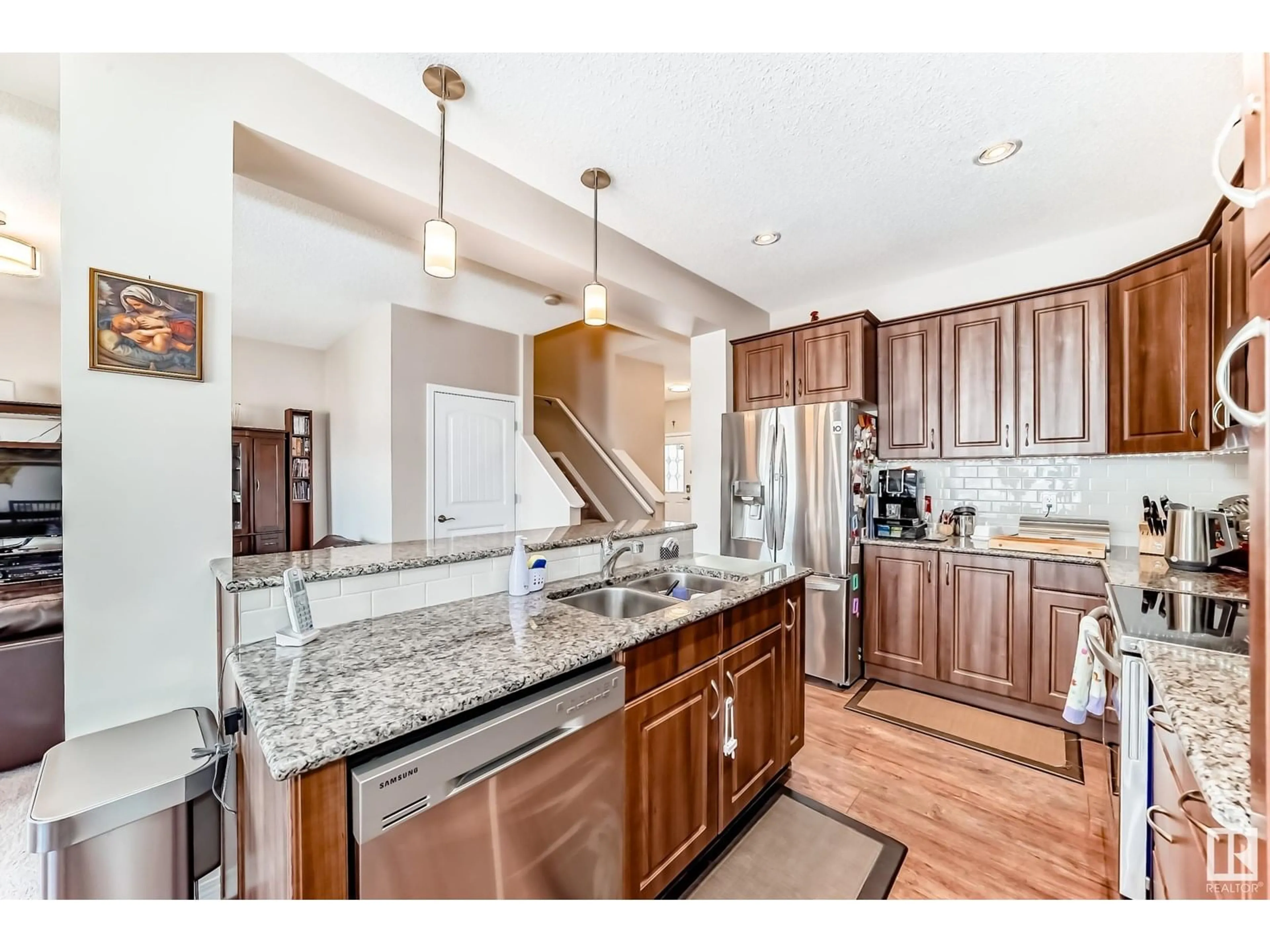 Open concept kitchen, ceramic/tile floor for 5870 ANTHONY CR, Edmonton Alberta T6W3H4