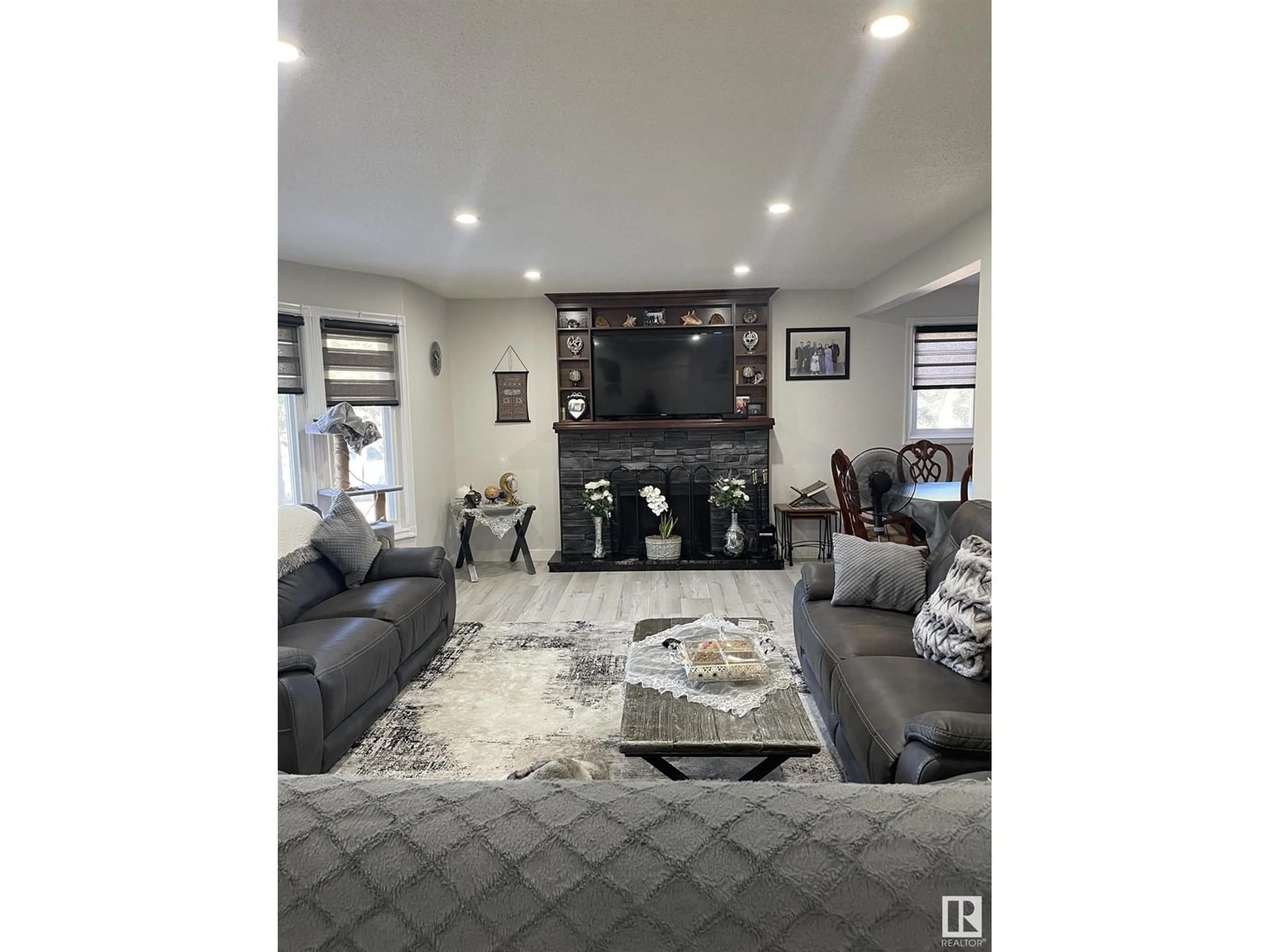 Living room with furniture, unknown for 12203 147 AV, Edmonton Alberta T5X1V4