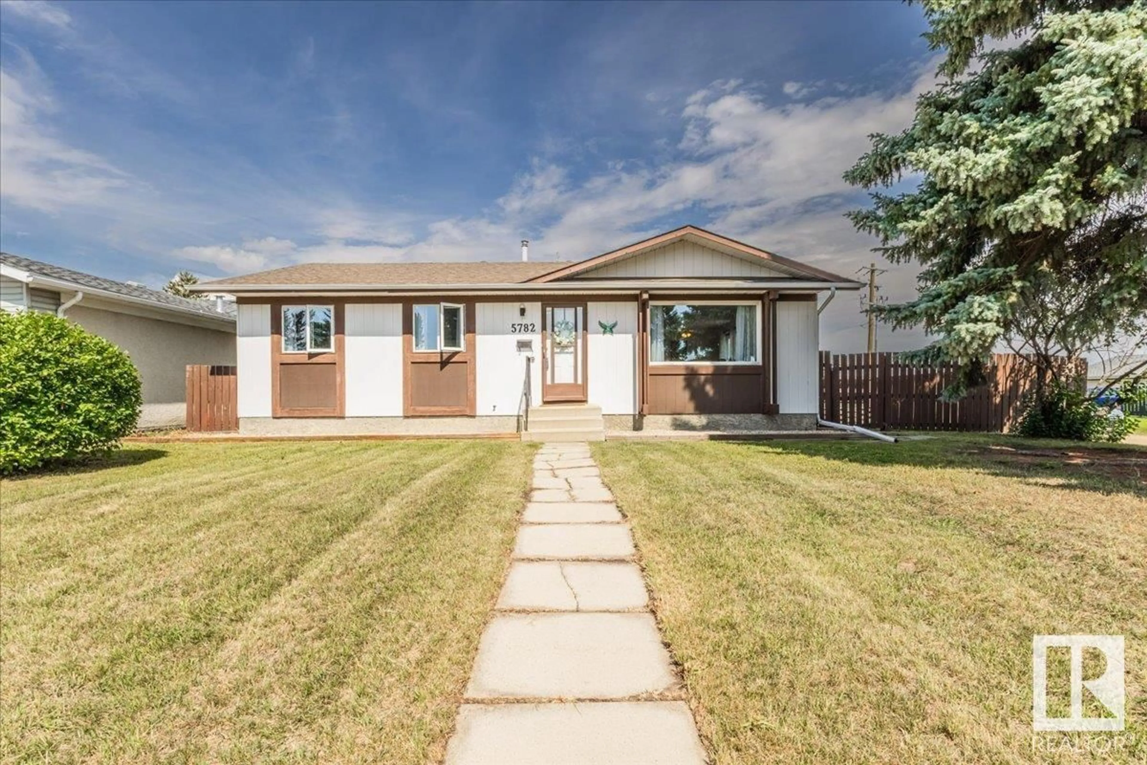 Home with brick exterior material, street for 5782 GARDEN MEADOWS DR, Wetaskiwin Alberta T9A2L6