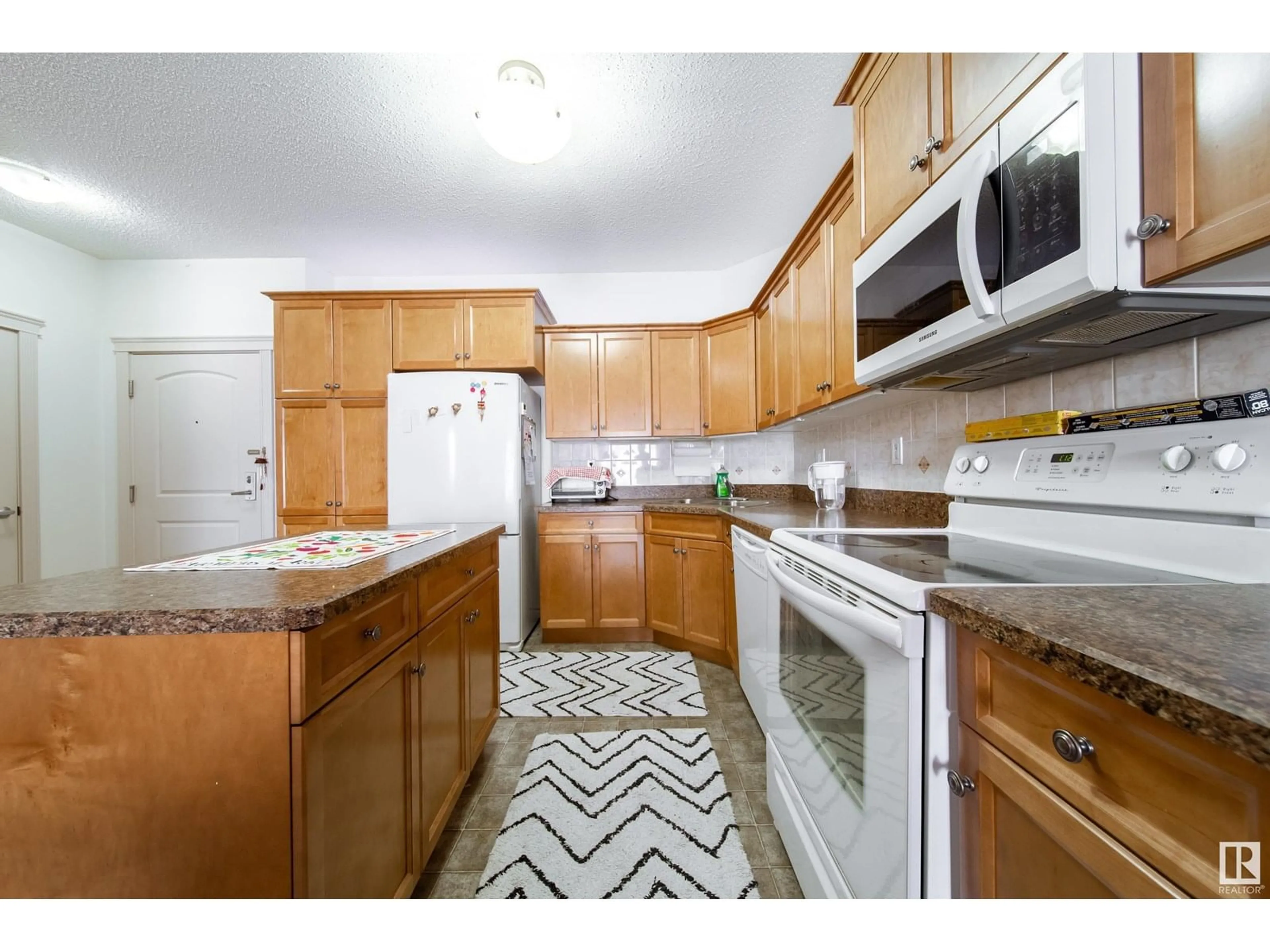 Standard kitchen, unknown for #216 - 9820 165 ST, Edmonton Alberta T5P0N3
