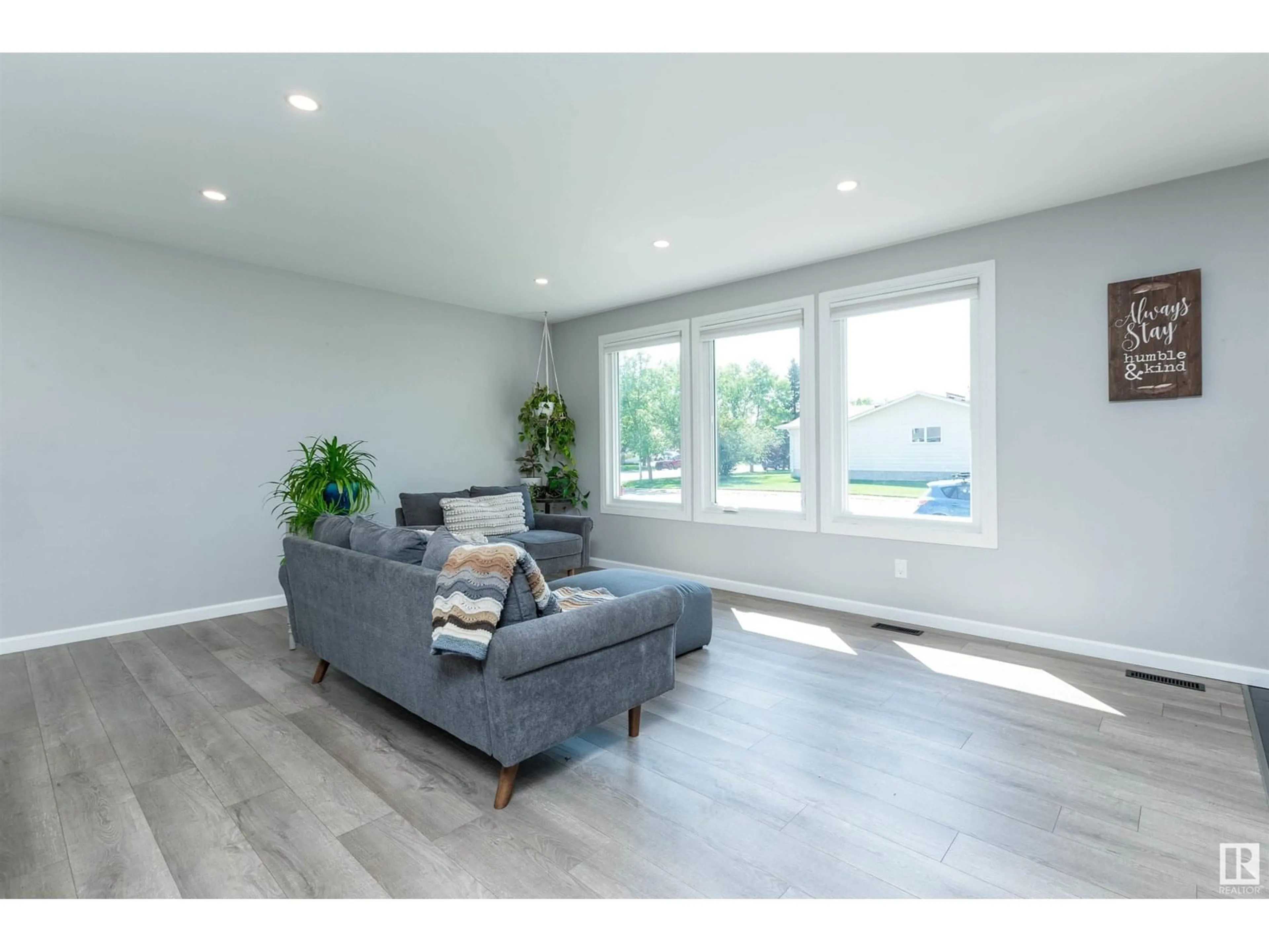 Living room with furniture, wood/laminate floor for 3513 36 ST, Leduc Alberta T9E6G6