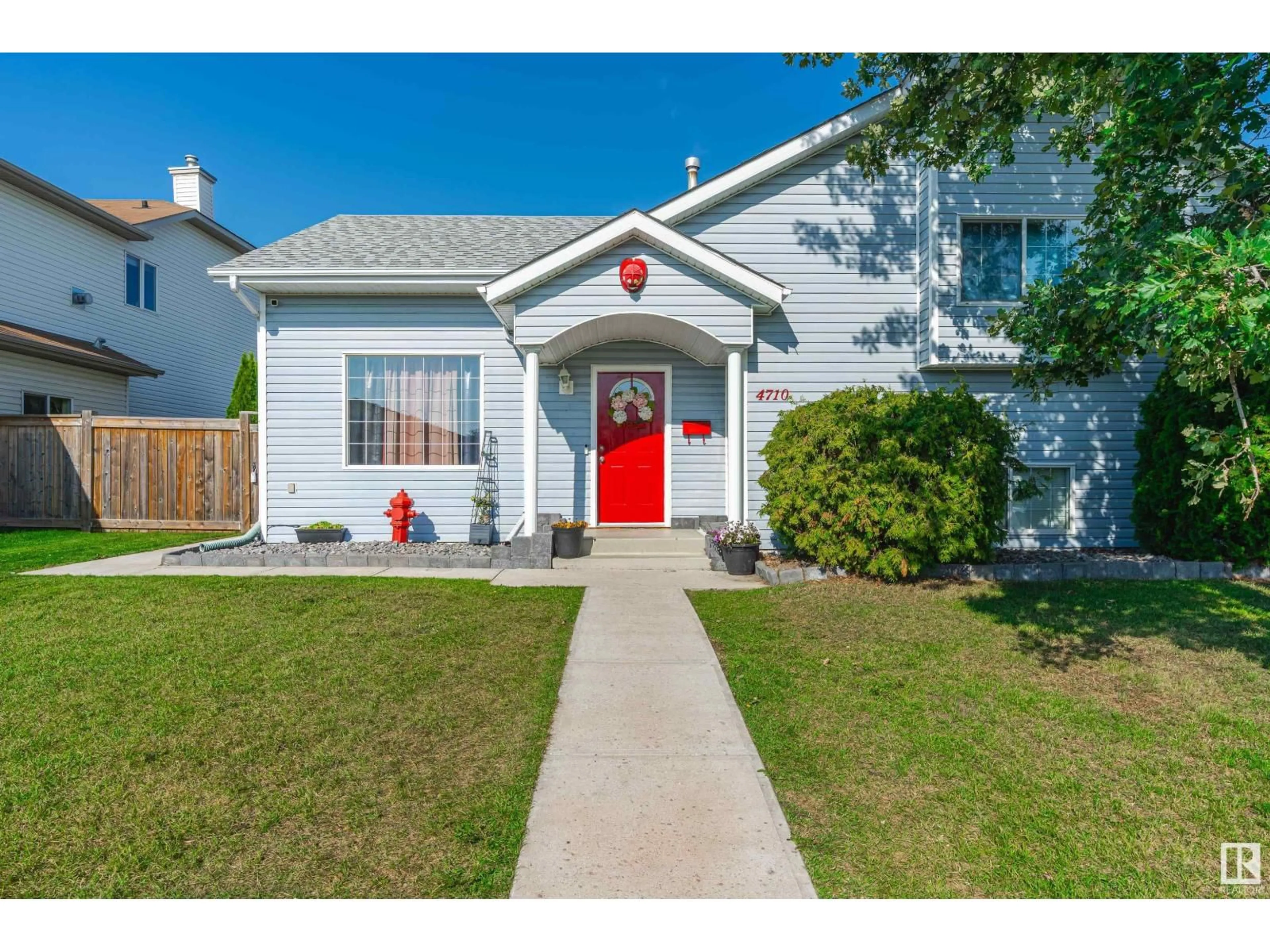 Home with vinyl exterior material, street for 4710 47 ST, Legal Alberta T0G1L0