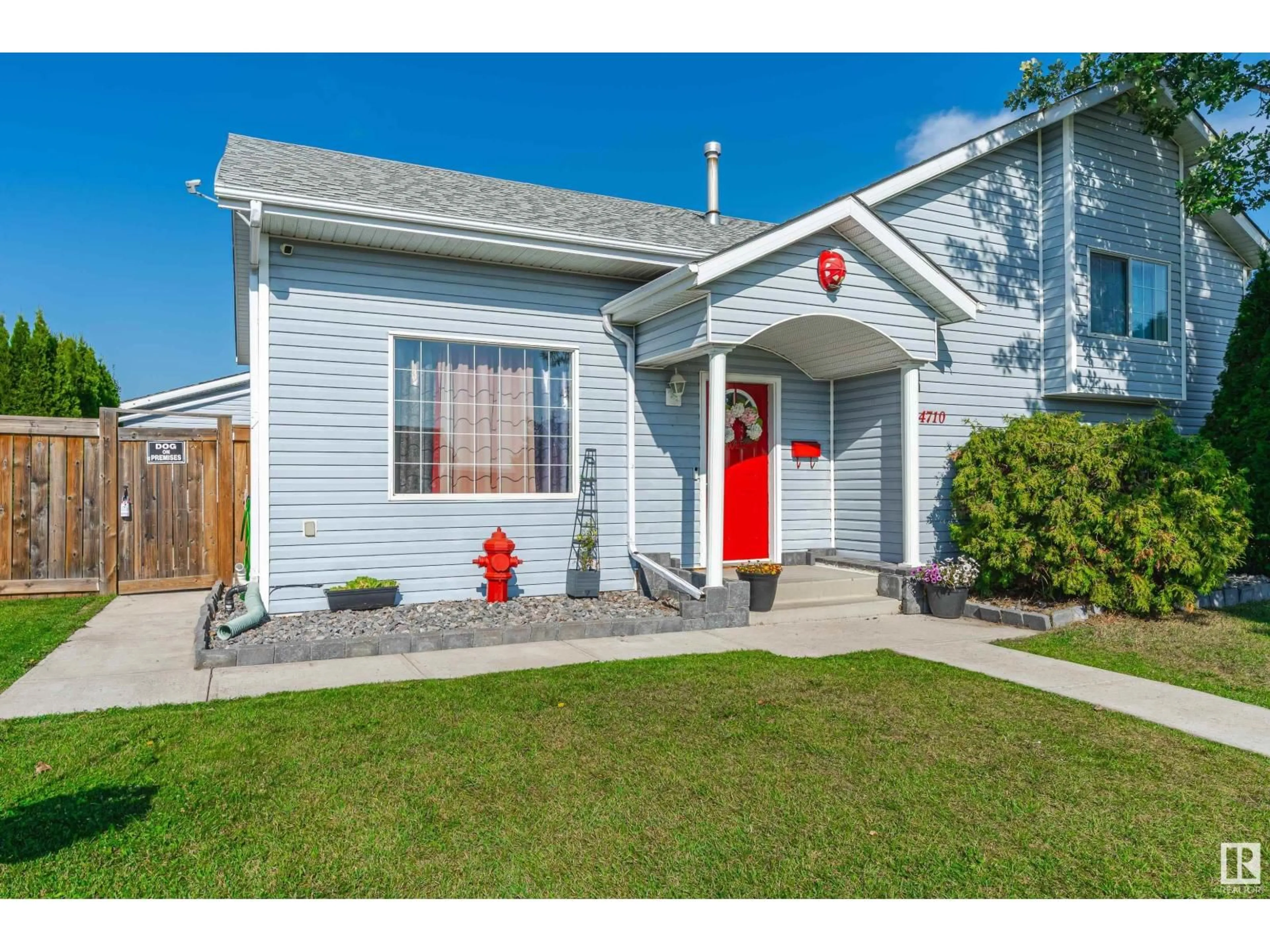 Home with vinyl exterior material, street for 4710 47 ST, Legal Alberta T0G1L0