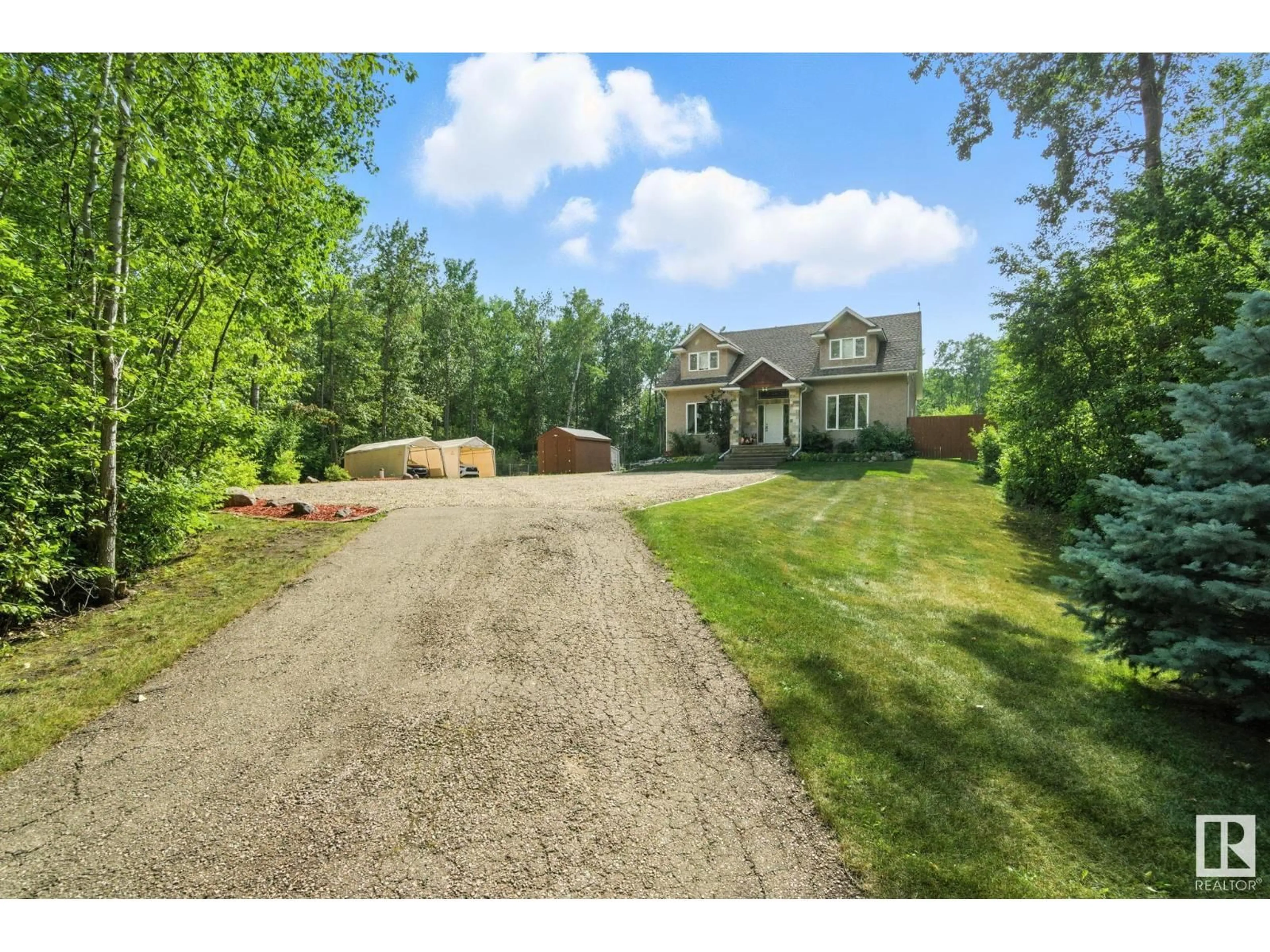 A pic from outside/outdoor area/front of a property/back of a property/a pic from drone, unknown for 54422 - 17 RGE ROAD 13, Rural Lac Ste. Anne County Alberta T0E1V2
