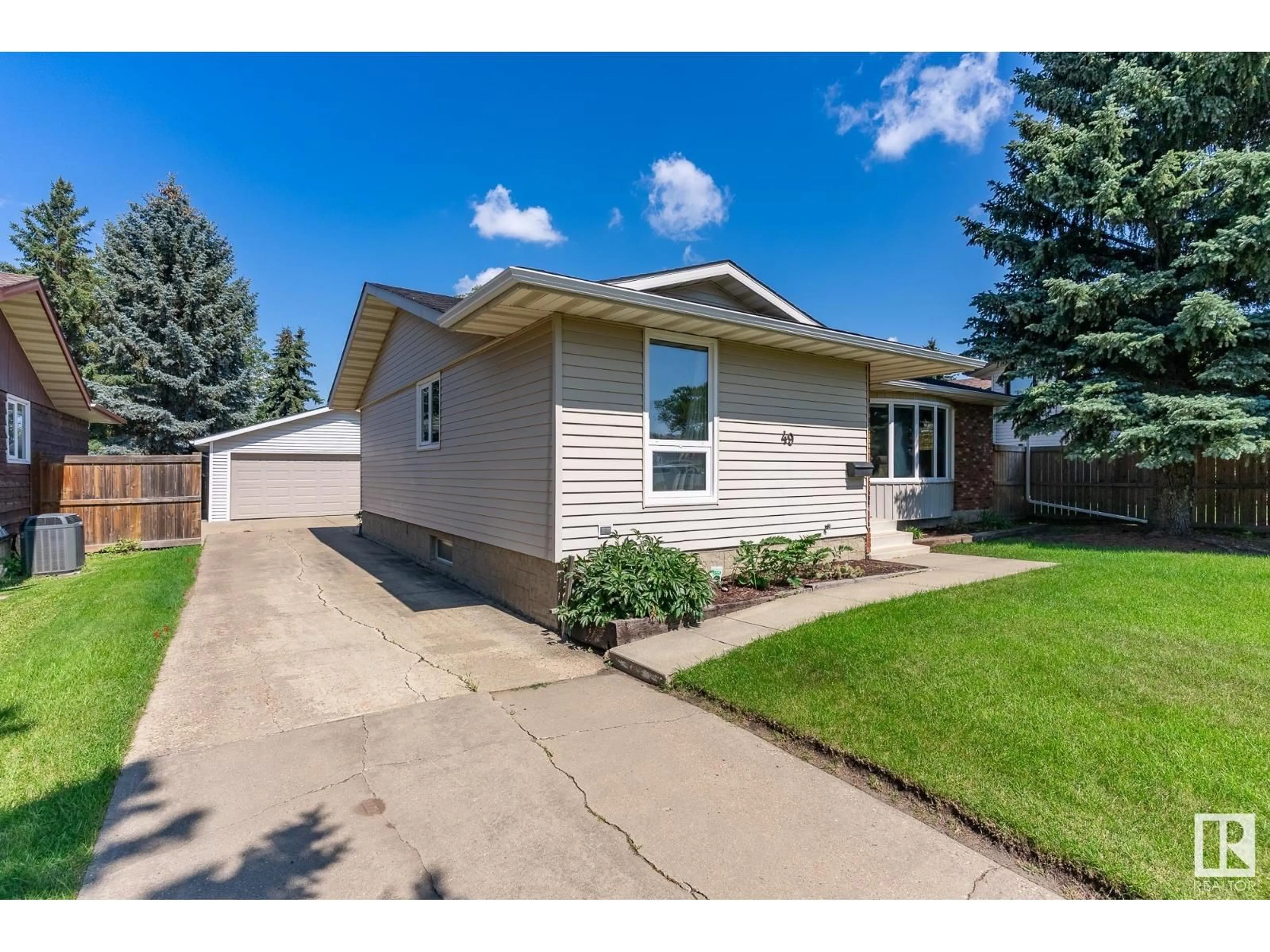 Home with vinyl exterior material, street for 49 MAIN BV, Sherwood Park Alberta T8A3N3