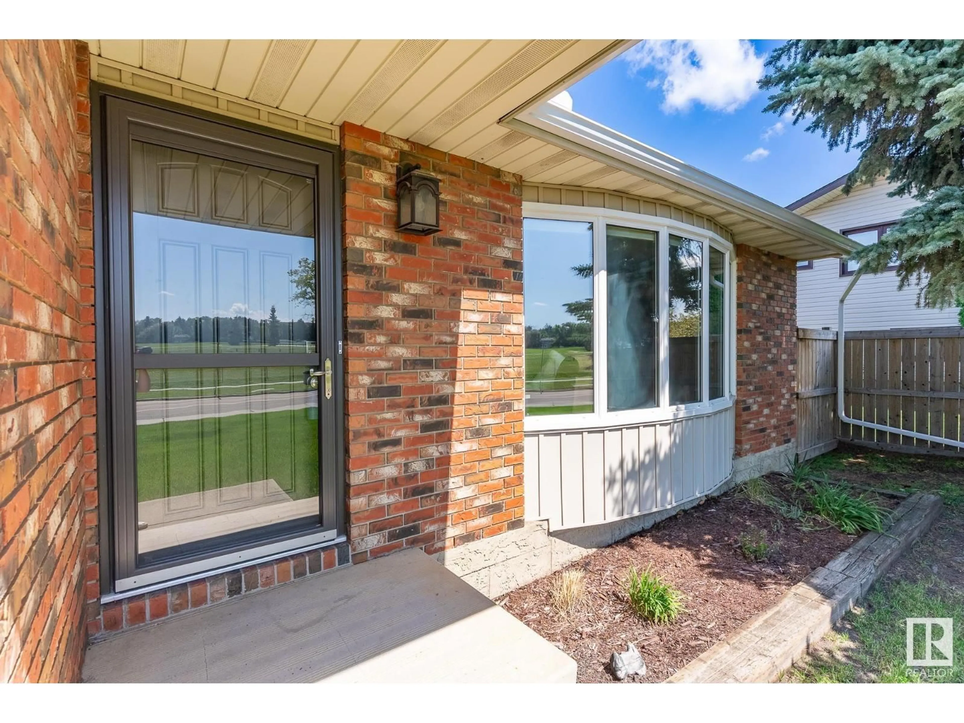 Home with brick exterior material, water/lake/river/ocean view for 49 MAIN BV, Sherwood Park Alberta T8A3N3