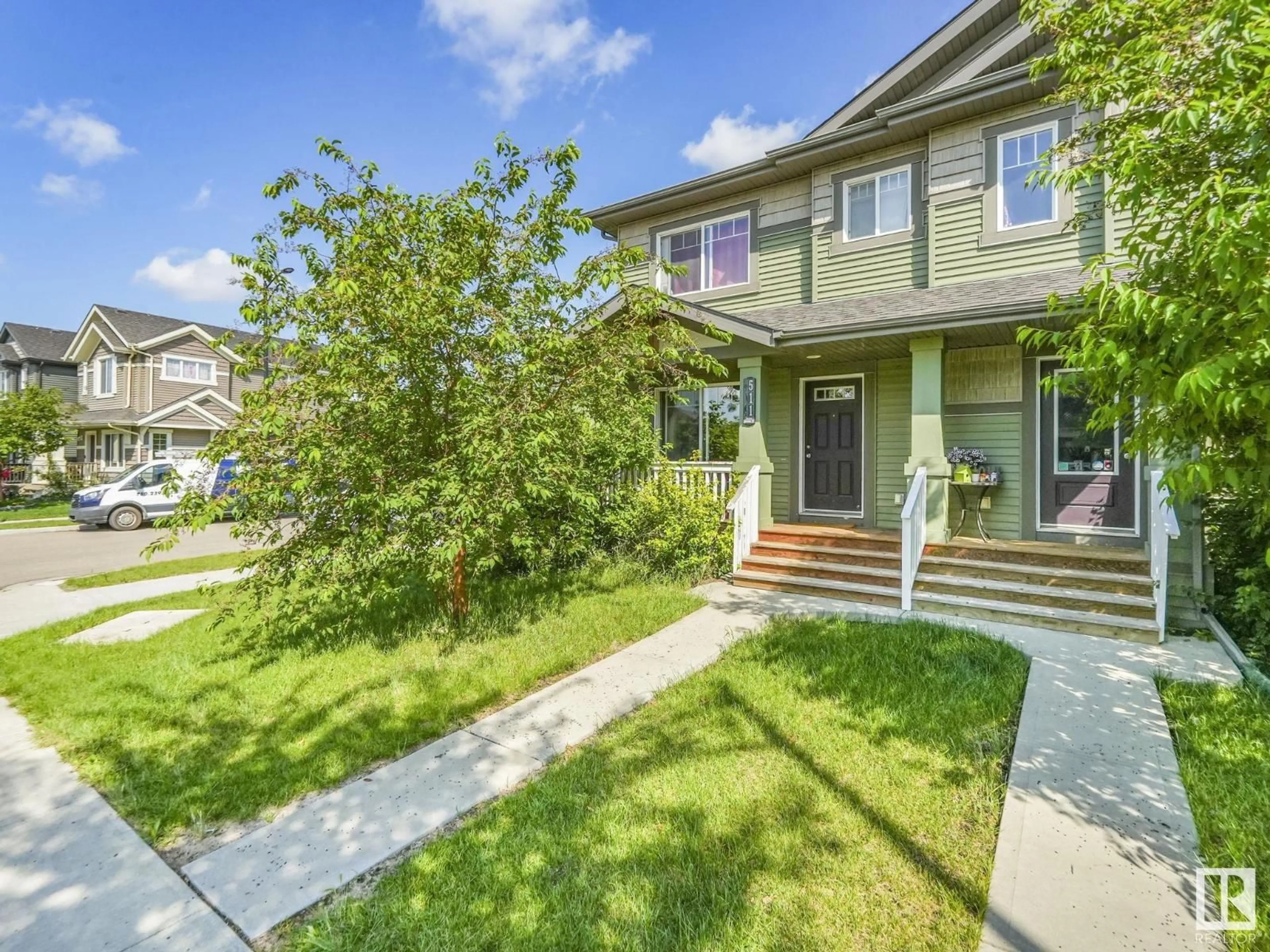 Home with vinyl exterior material, street for 511 ORCHARDS BV, Edmonton Alberta T6X2B7