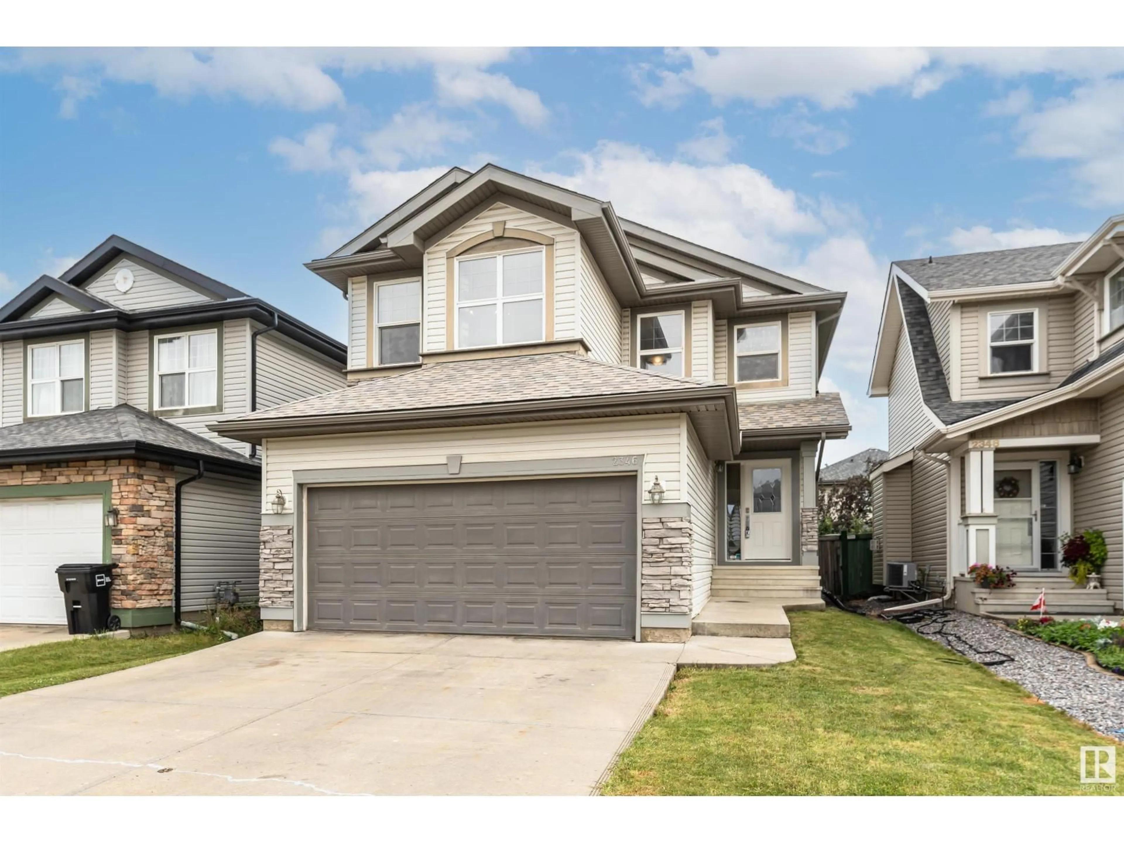 Home with vinyl exterior material, street for 2346 HAGEN LI, Edmonton Alberta T6R0B2