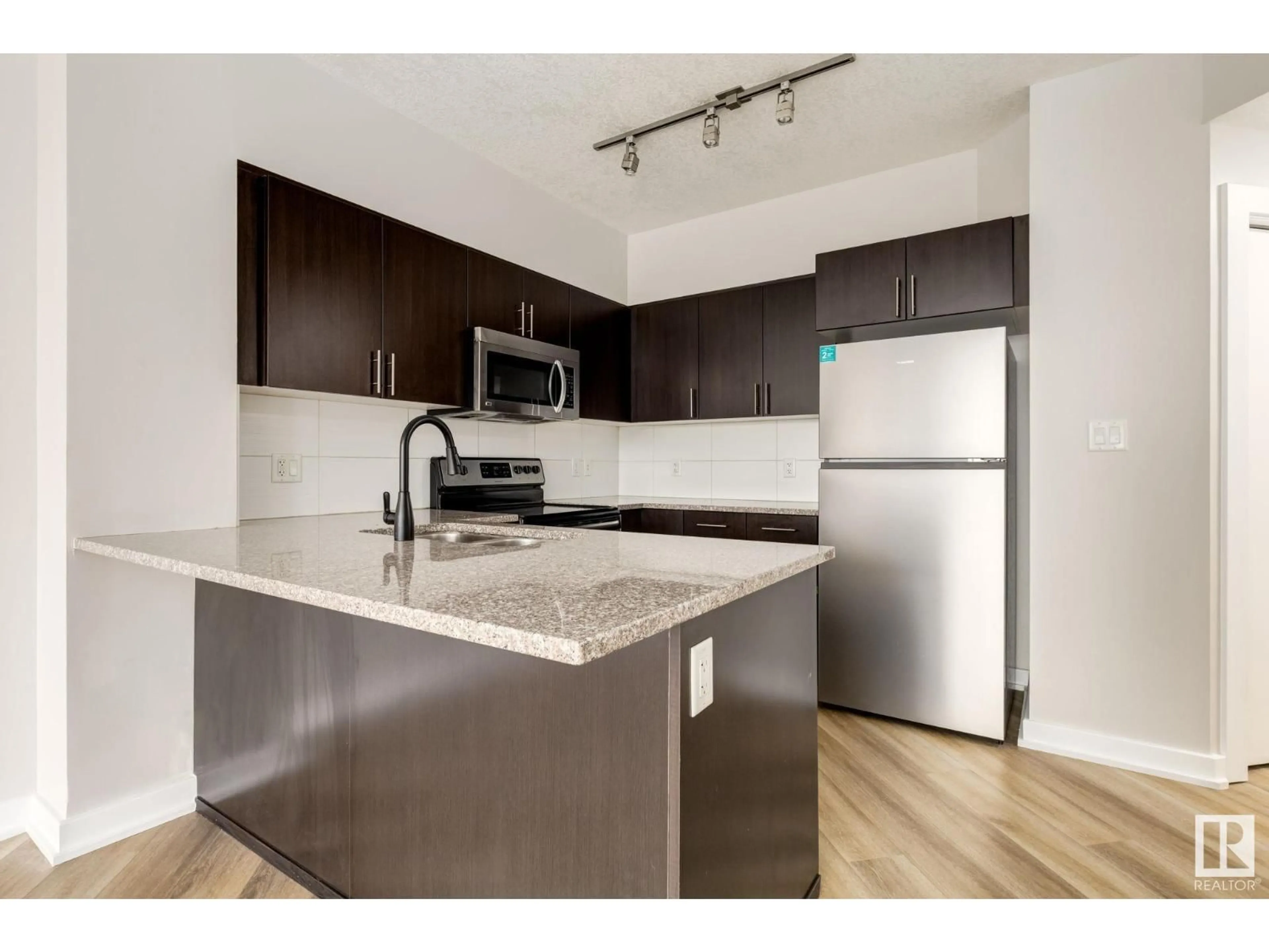 Standard kitchen, wood/laminate floor for #2303 - 10152 104 ST, Edmonton Alberta T5J0B6