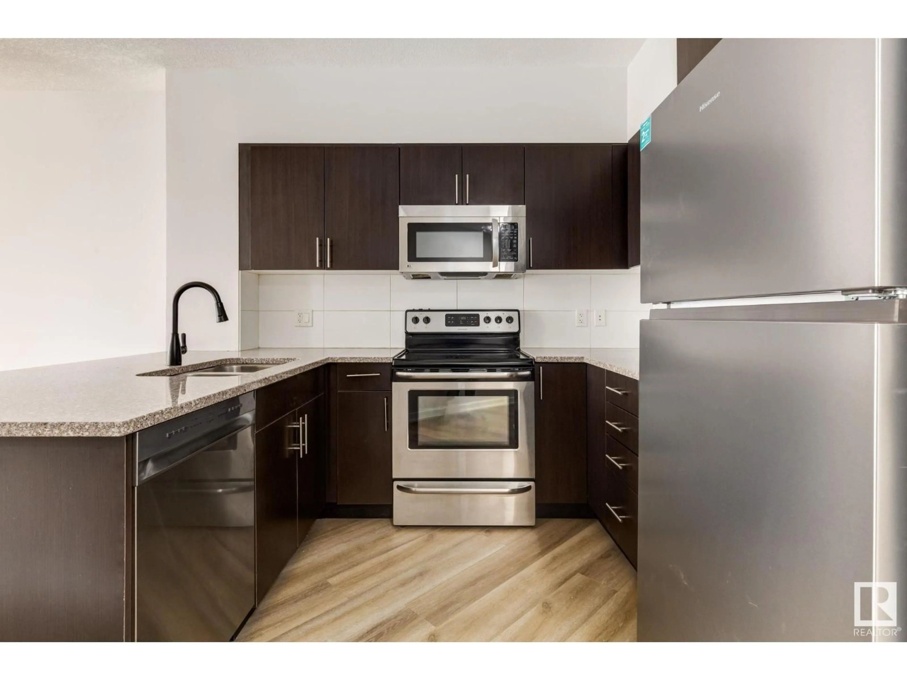 Standard kitchen, wood/laminate floor for #2303 - 10152 104 ST, Edmonton Alberta T5J0B6