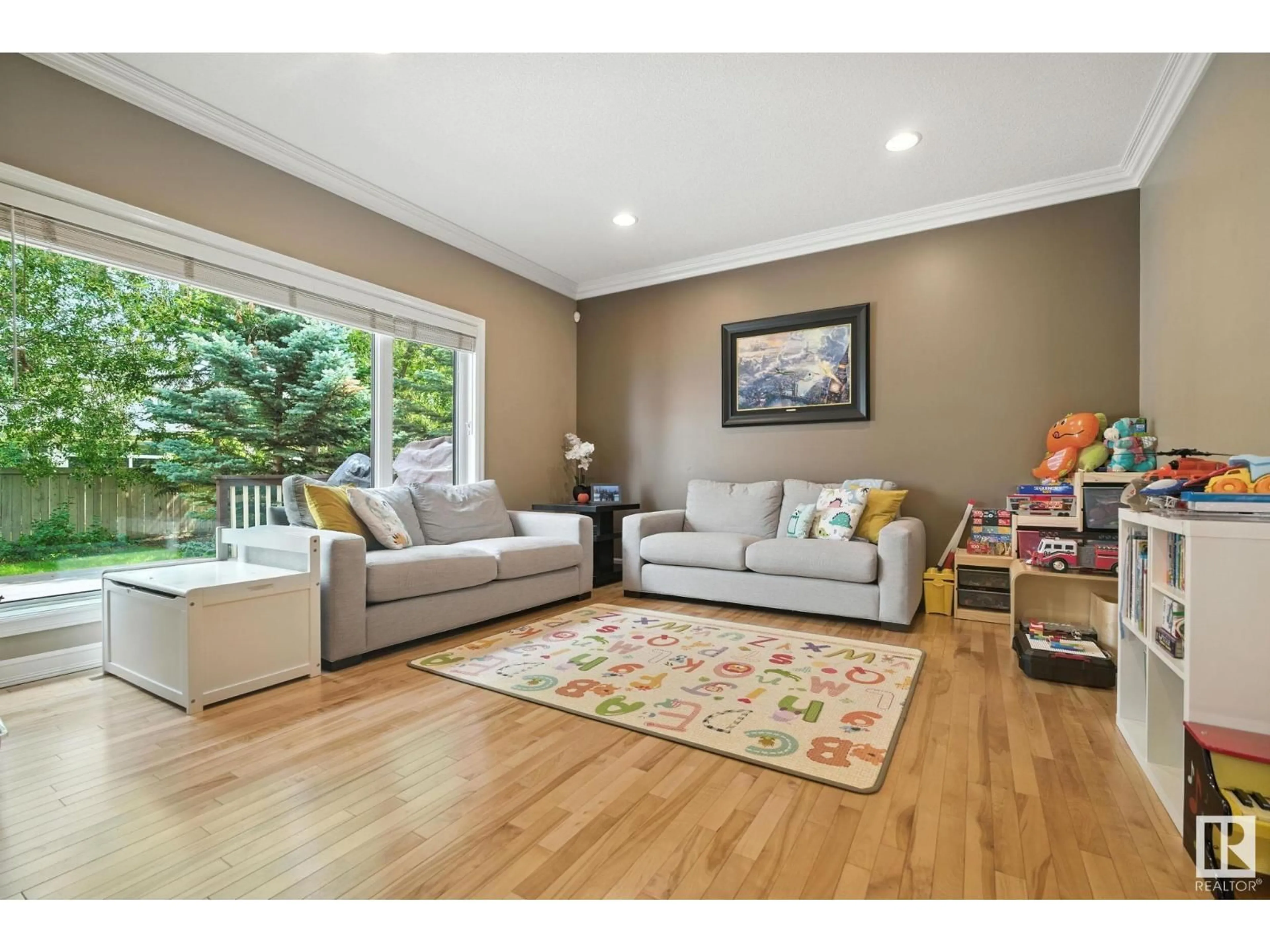 Living room with furniture, wood/laminate floor for 858 TWIN BROOKS CL, Edmonton Alberta T6J7G6