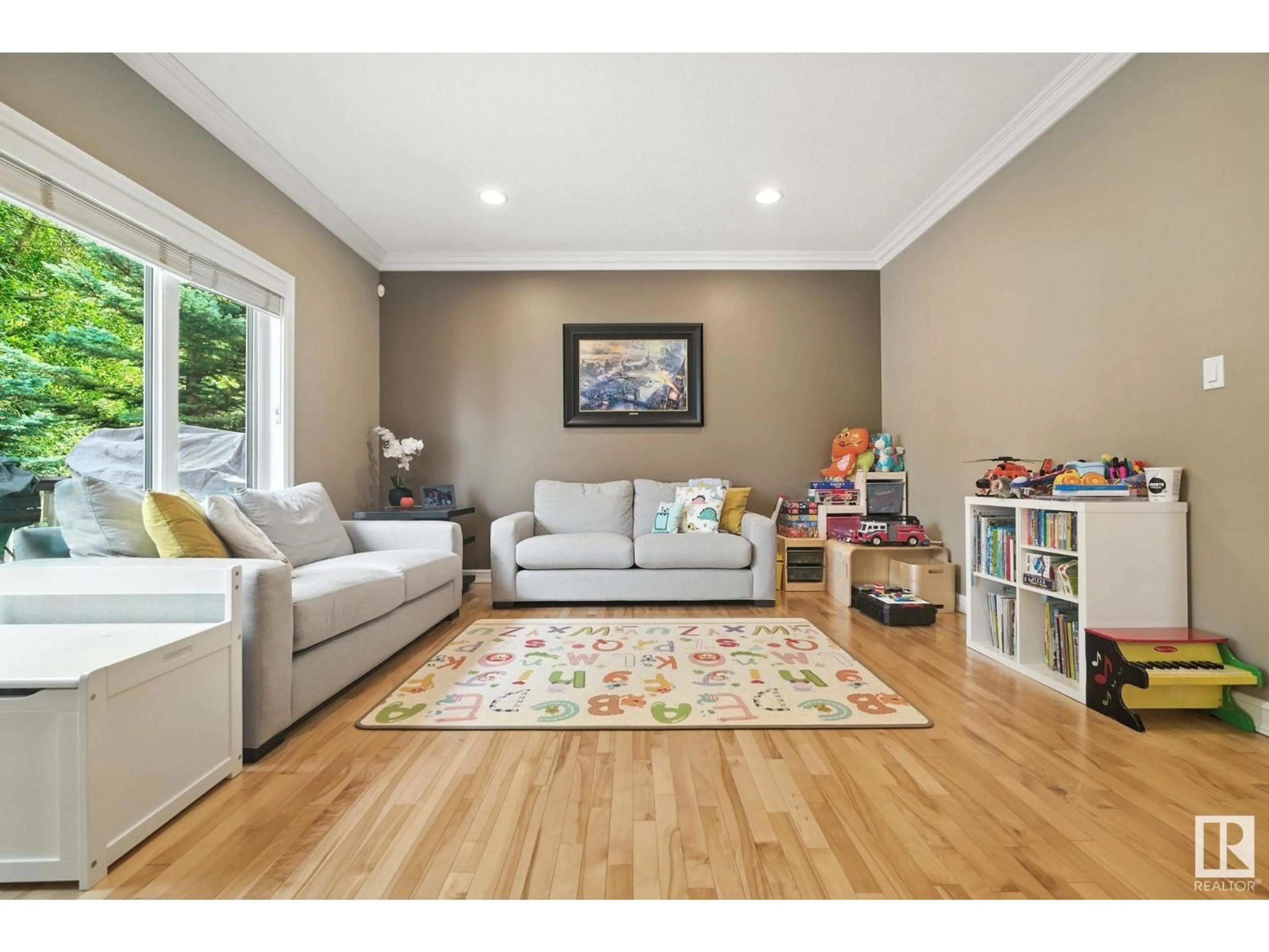 Living room with furniture, wood/laminate floor for 858 TWIN BROOKS CL, Edmonton Alberta T6J7G6