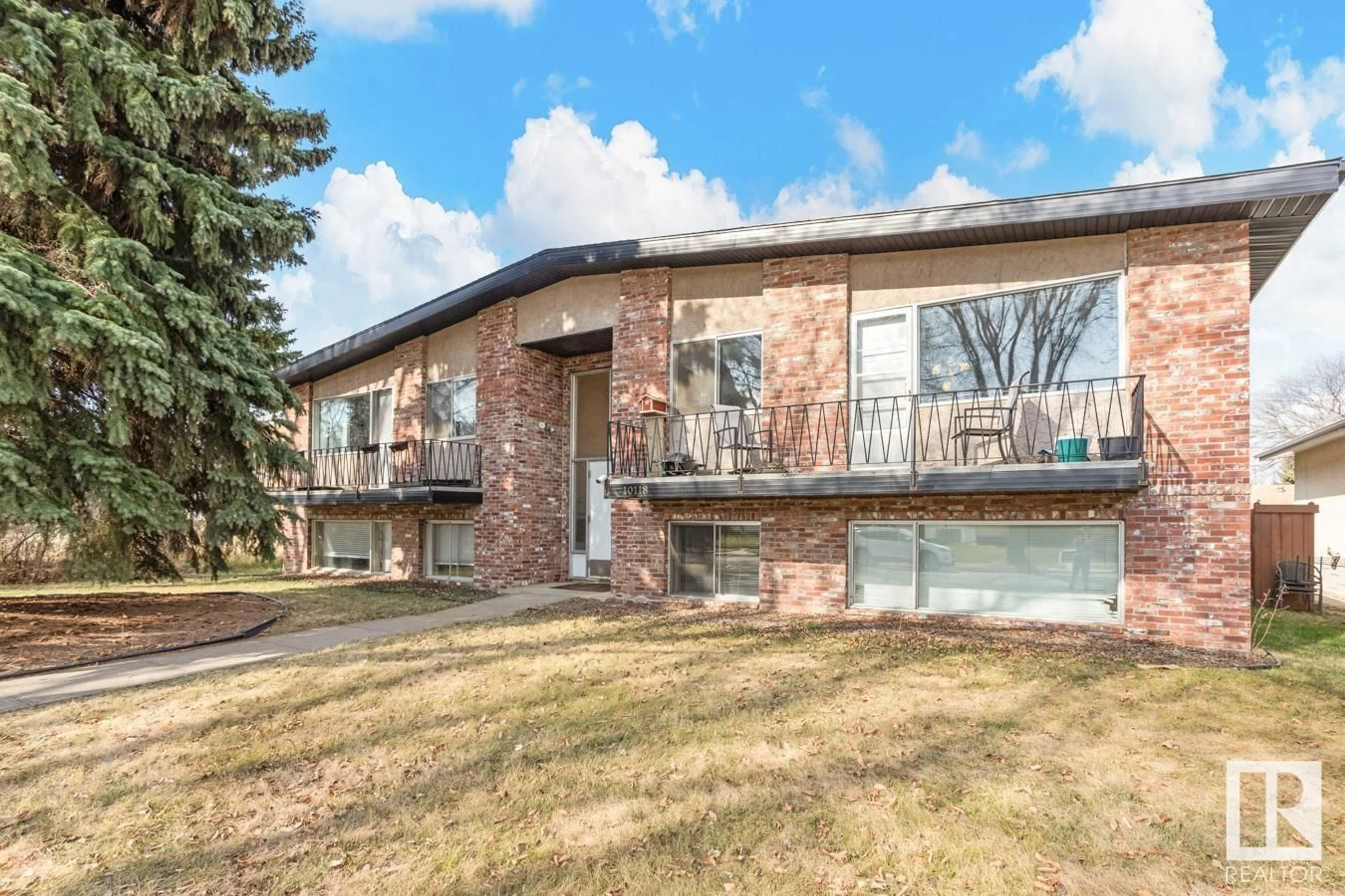 Home with brick exterior material, street for NW - 10118 82 ST, Edmonton Alberta T6A3M2