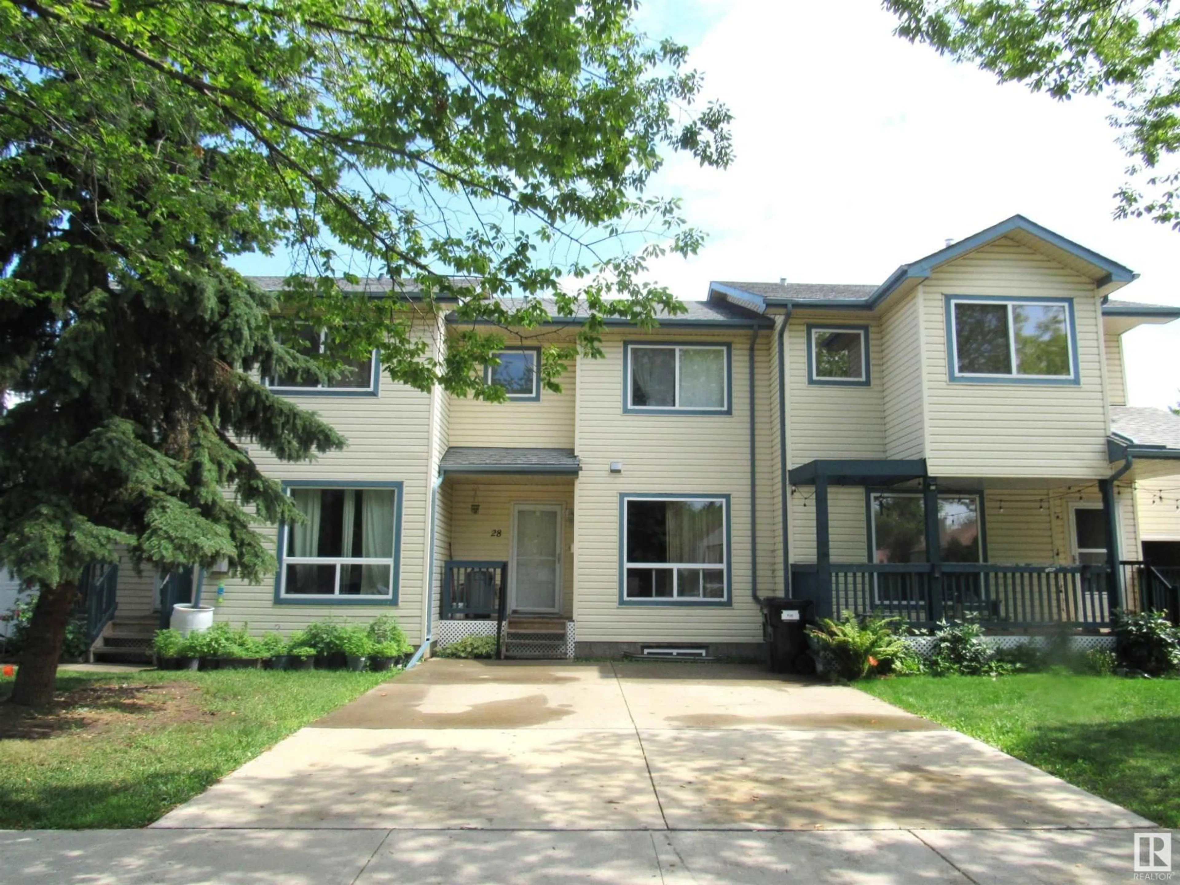 Home with vinyl exterior material, street for #28 - 10909 106 ST NW, Edmonton Alberta T5H4M7