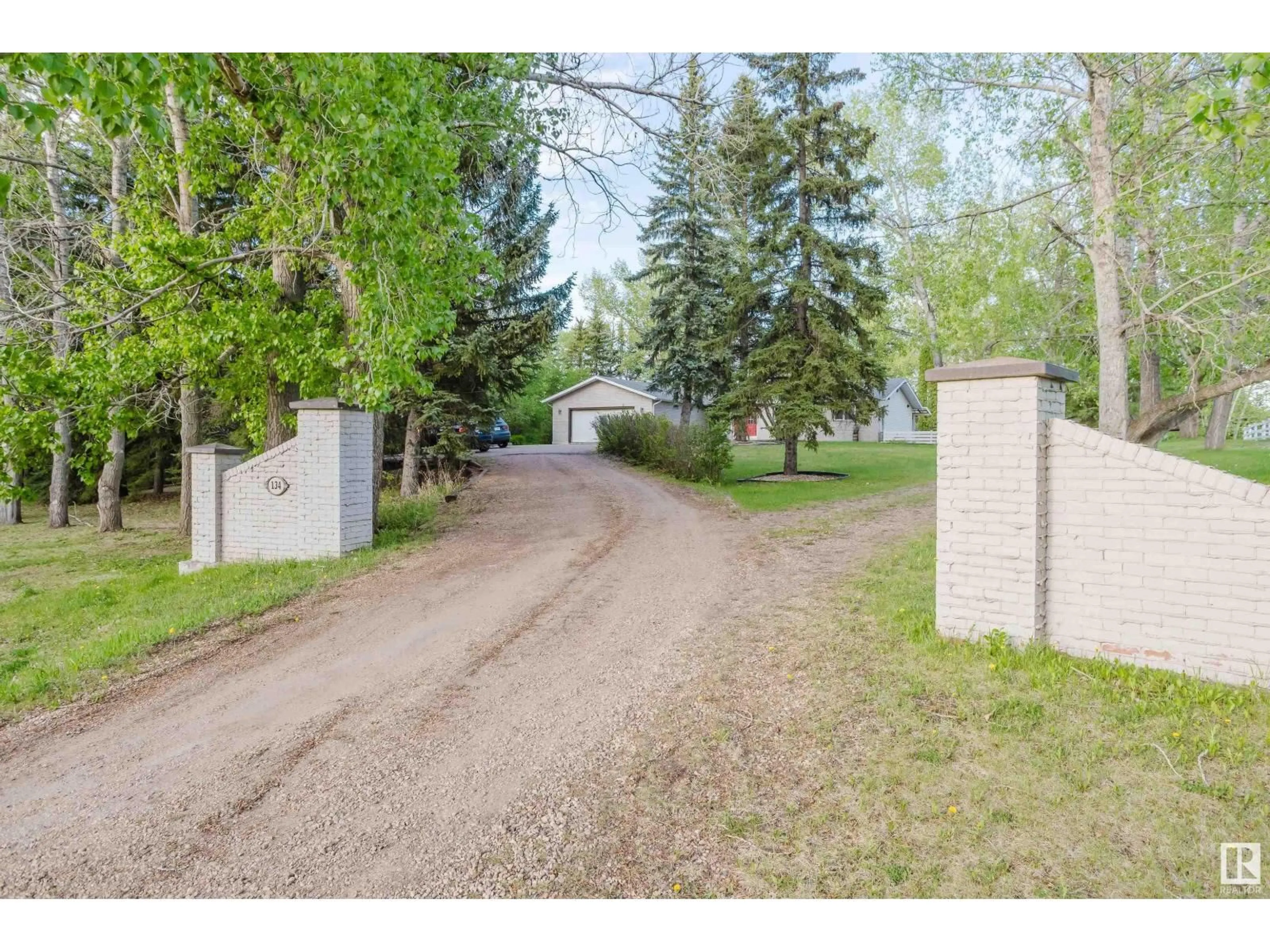 A pic from outside/outdoor area/front of a property/back of a property/a pic from drone, street for 52552 224 - 134 RANGE RD, Rural Strathcona County Alberta T8A4R7