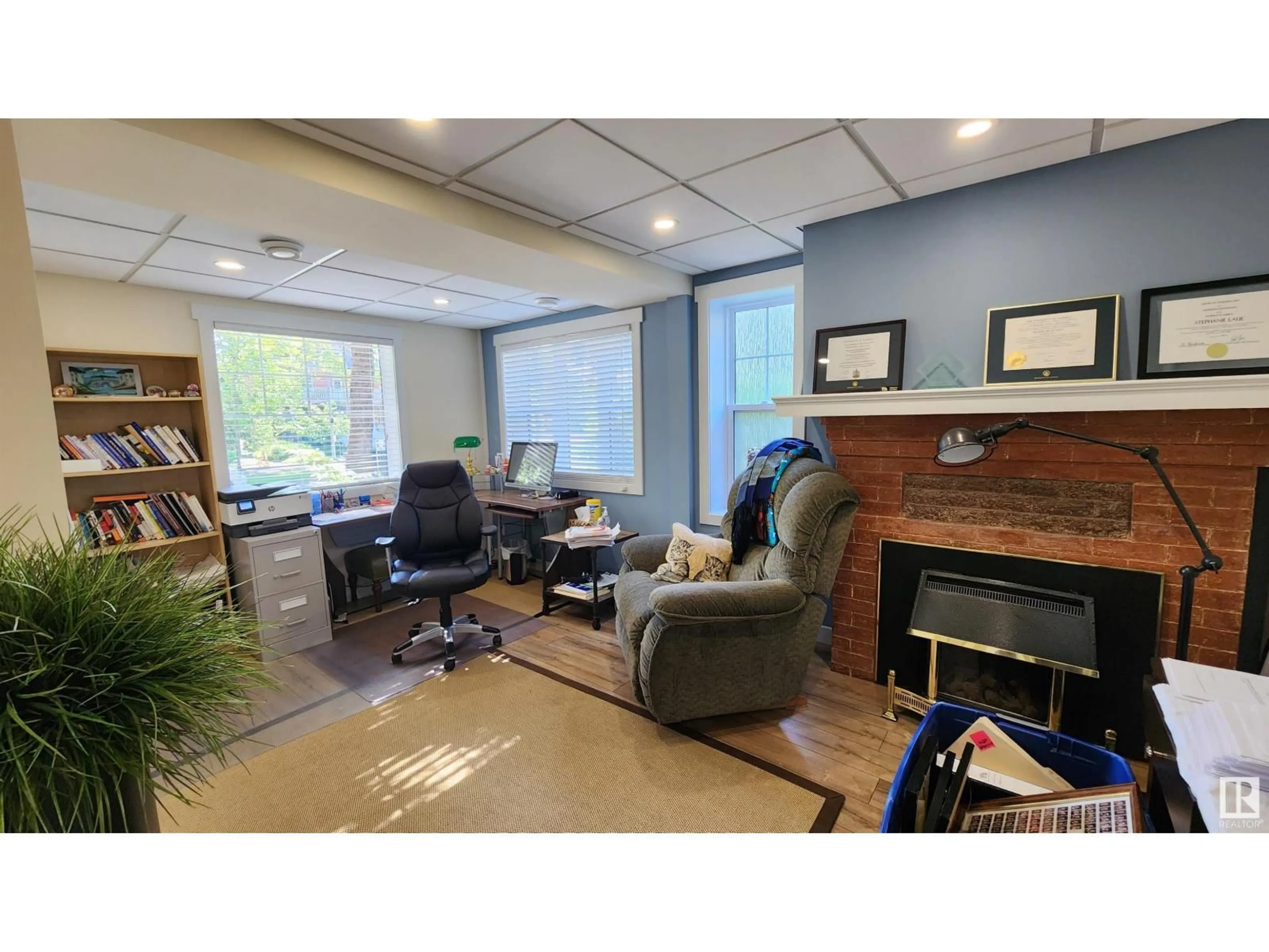 Living room with furniture, unknown for 8612 104 ST, Edmonton Alberta T6E4G5