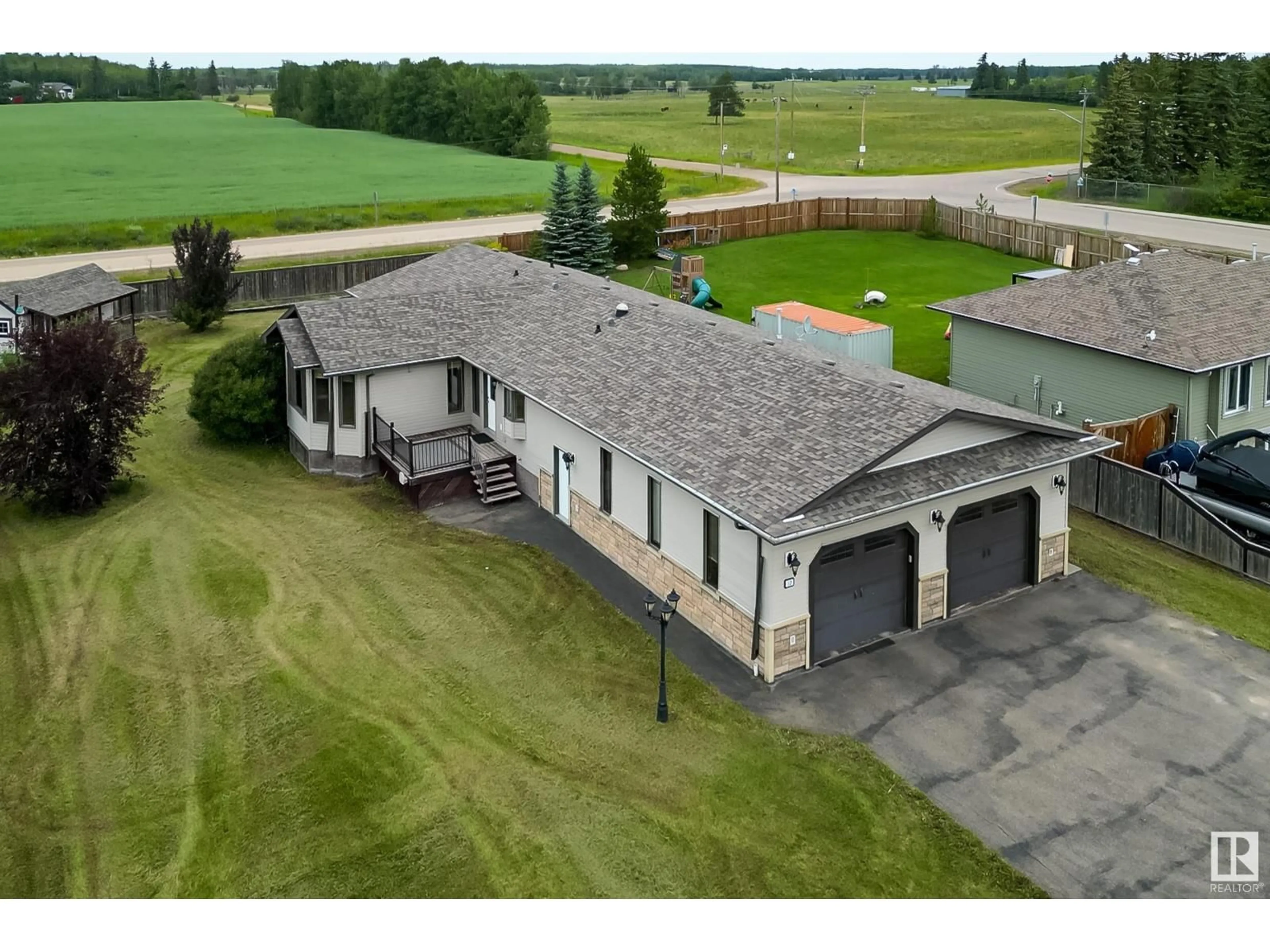 A pic from outside/outdoor area/front of a property/back of a property/a pic from drone, building for 12 FALCON DRIVE, New Sarepta Alberta T0B3M0