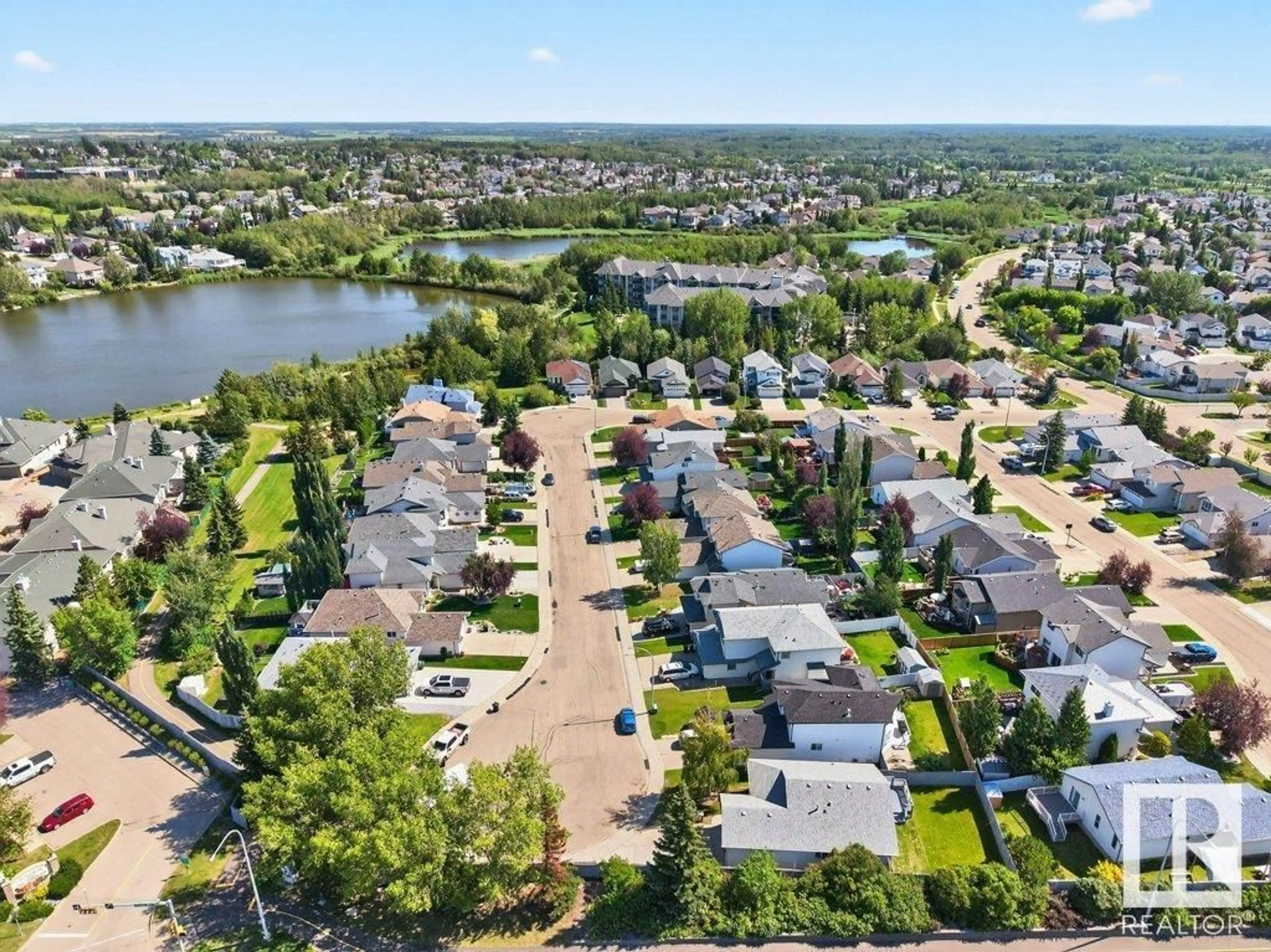 A pic from outside/outdoor area/front of a property/back of a property/a pic from drone, water/lake/river/ocean view for 124 FOXHAVEN CO, Sherwood Park Alberta T8A5X2
