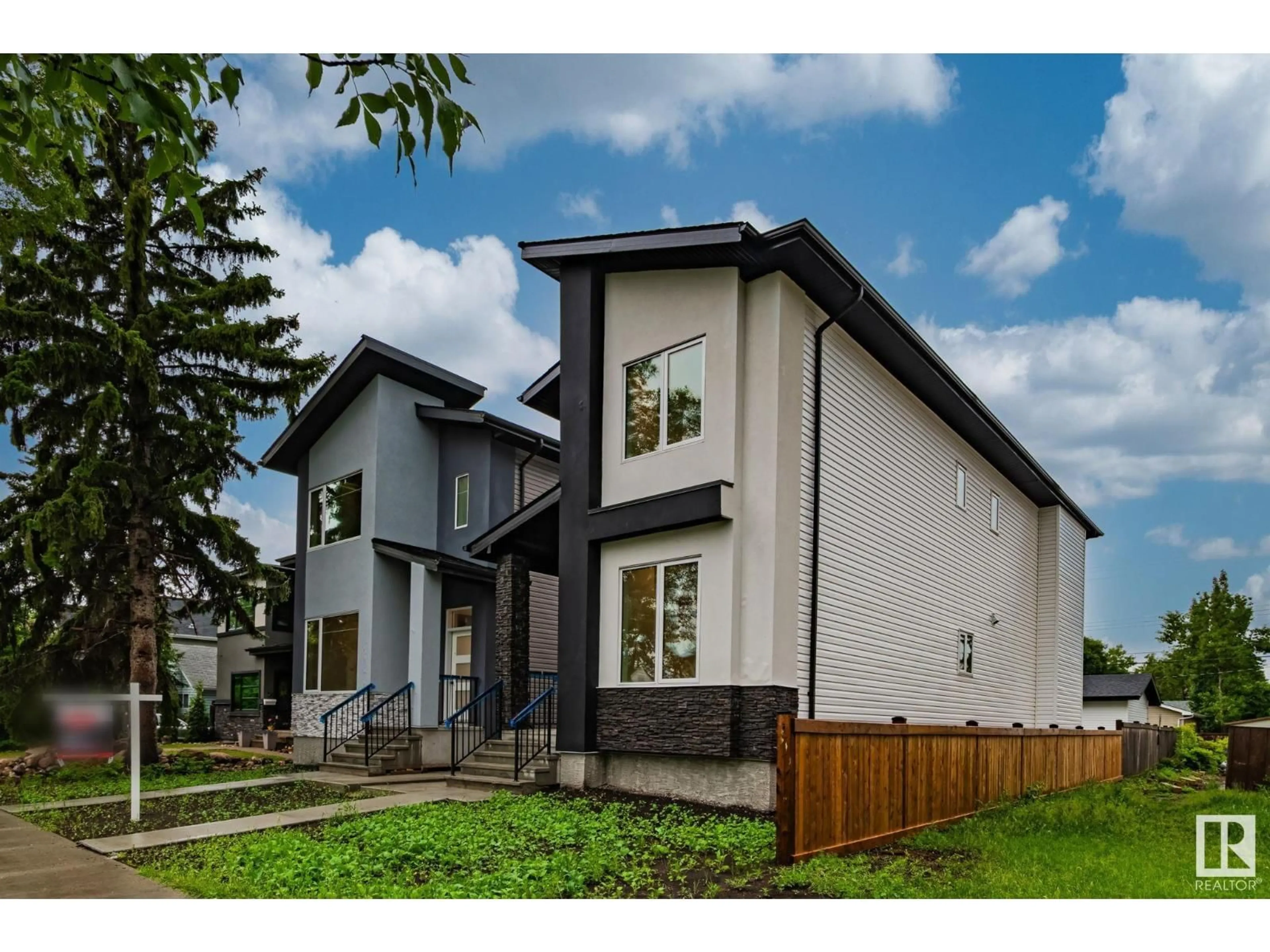 Home with brick exterior material, street for NW - 11036 128 ST, Edmonton Alberta T5M0W6