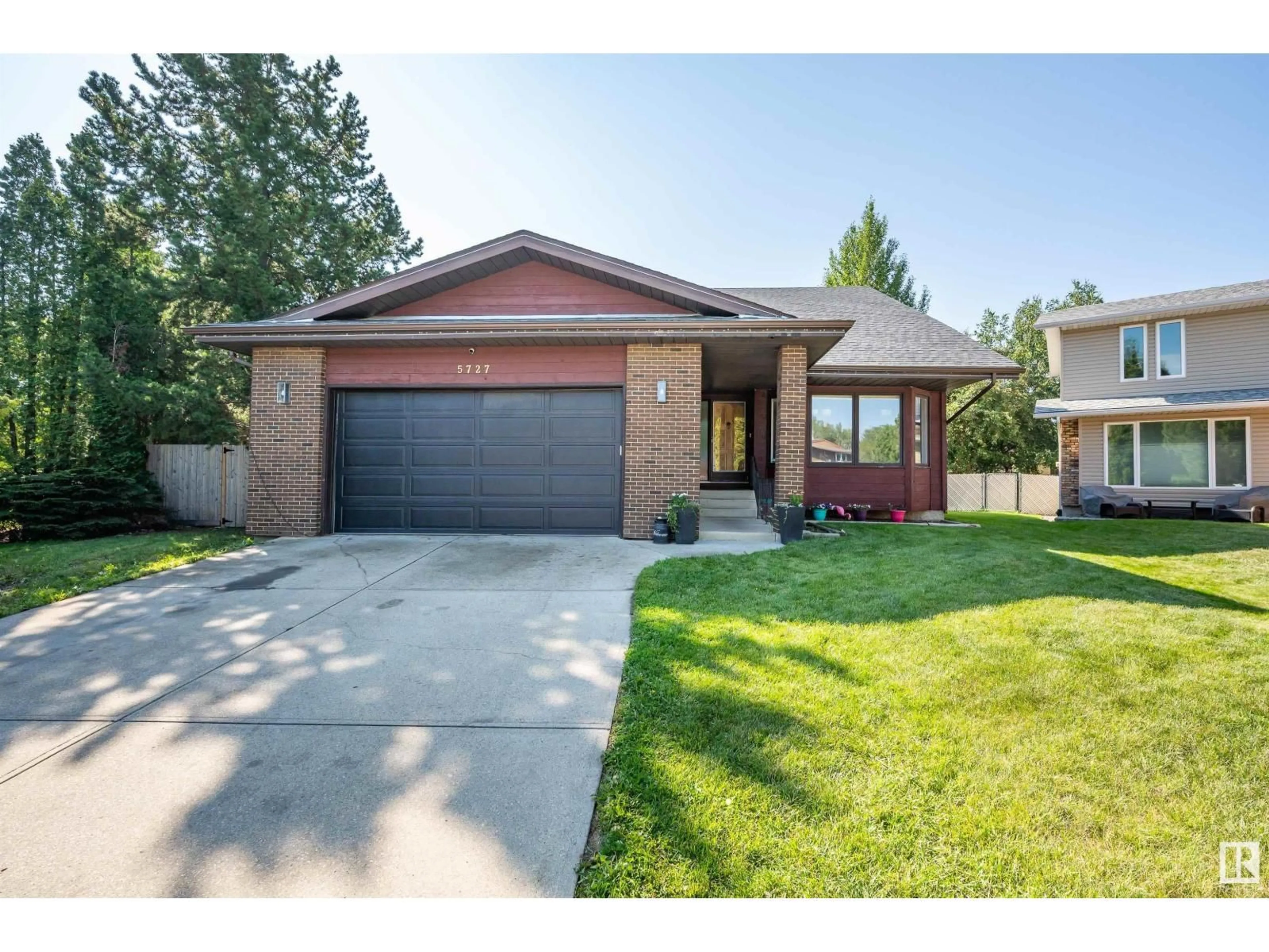 Home with brick exterior material, street for 5727 172 ST, Edmonton Alberta T6M1A4