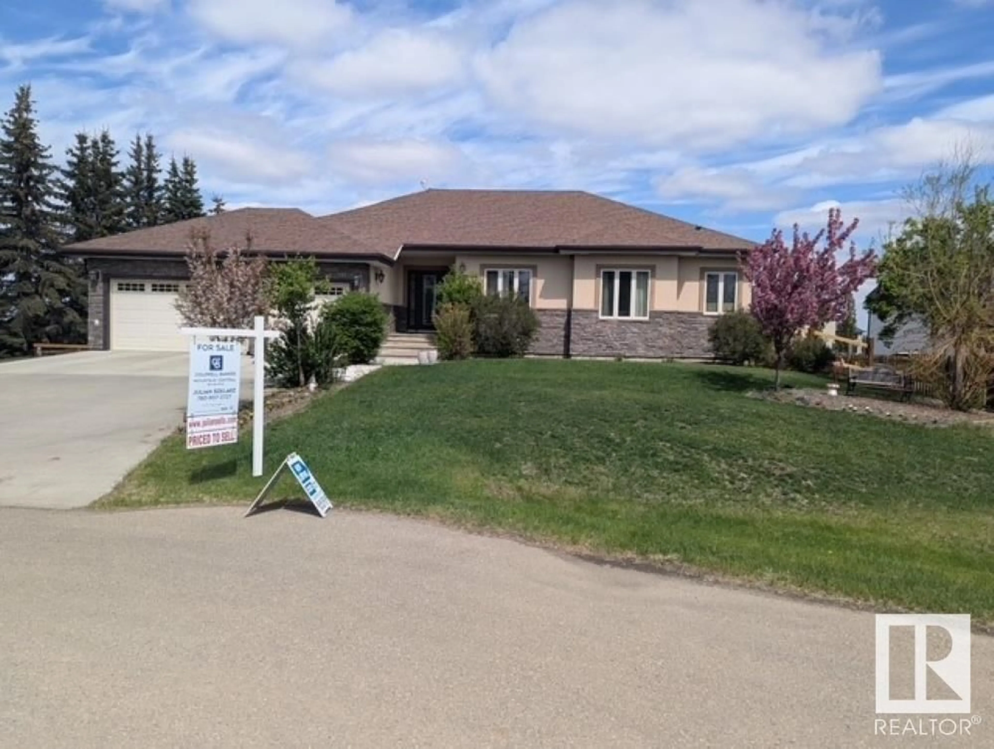 A pic from outside/outdoor area/front of a property/back of a property/a pic from drone, unknown for 26116A HWY 16, Rural Parkland County Alberta T7Y1A1