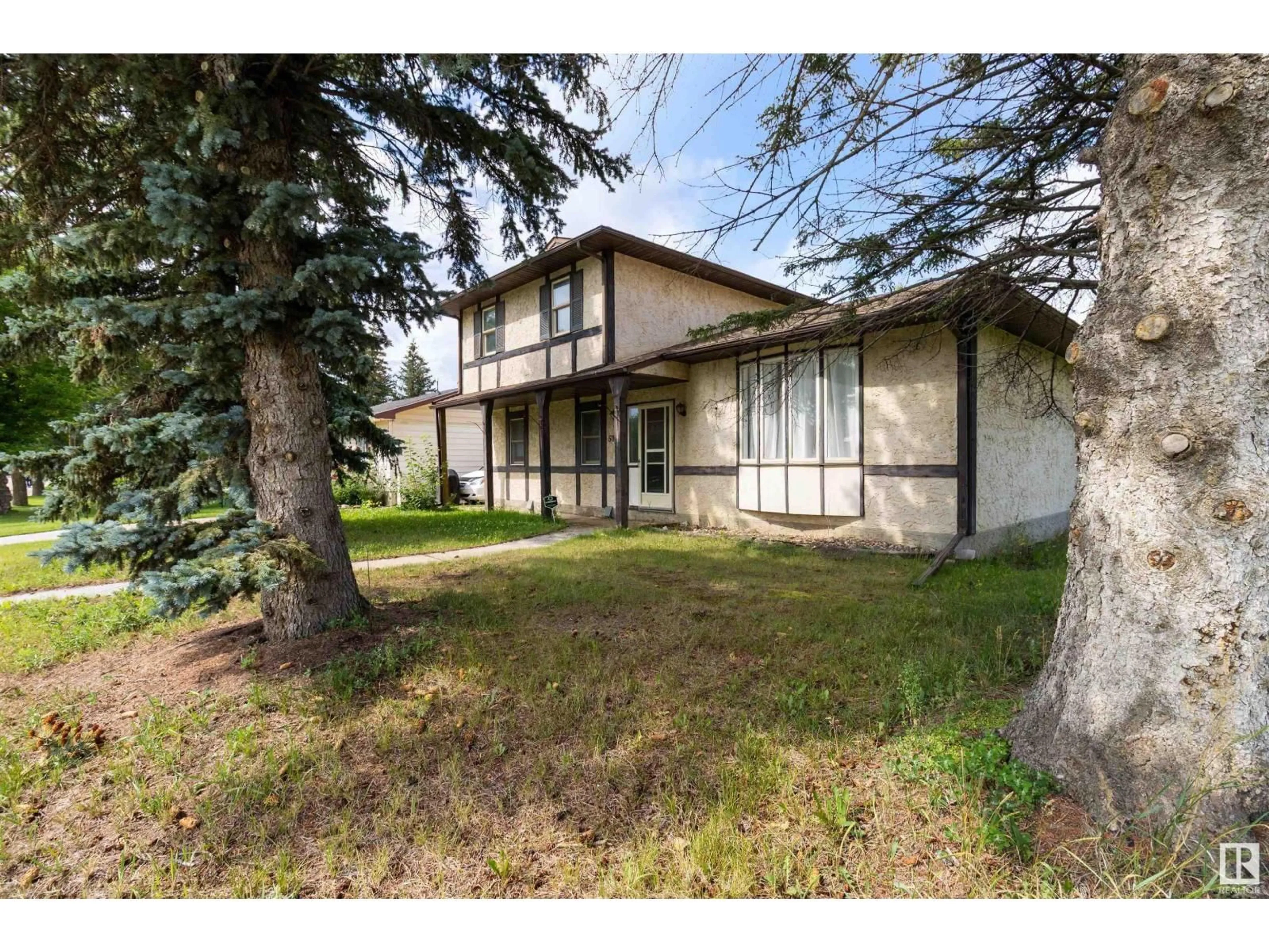 A pic from outside/outdoor area/front of a property/back of a property/a pic from drone, street for 5028 54 AV, Tofield Alberta T0B4J0