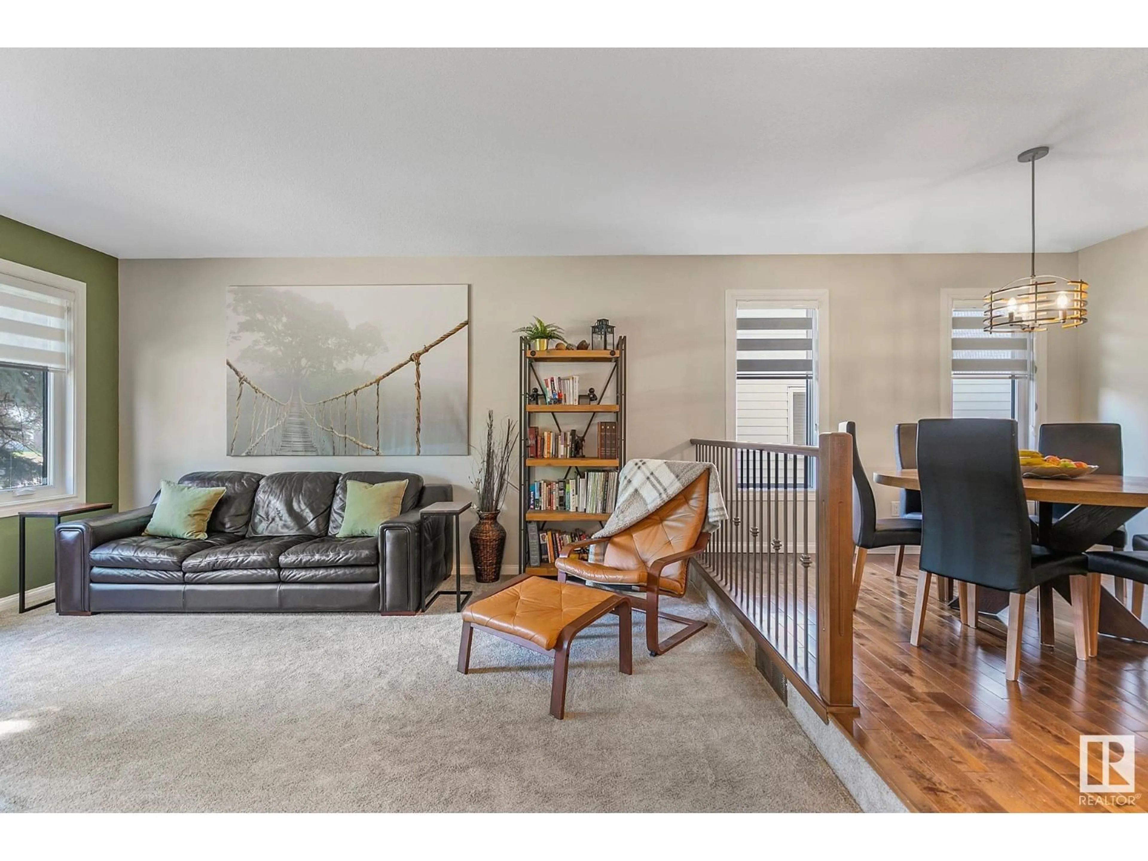 Living room with furniture, wood/laminate floor for 15808 76 ST, Edmonton Alberta T5Z2S1
