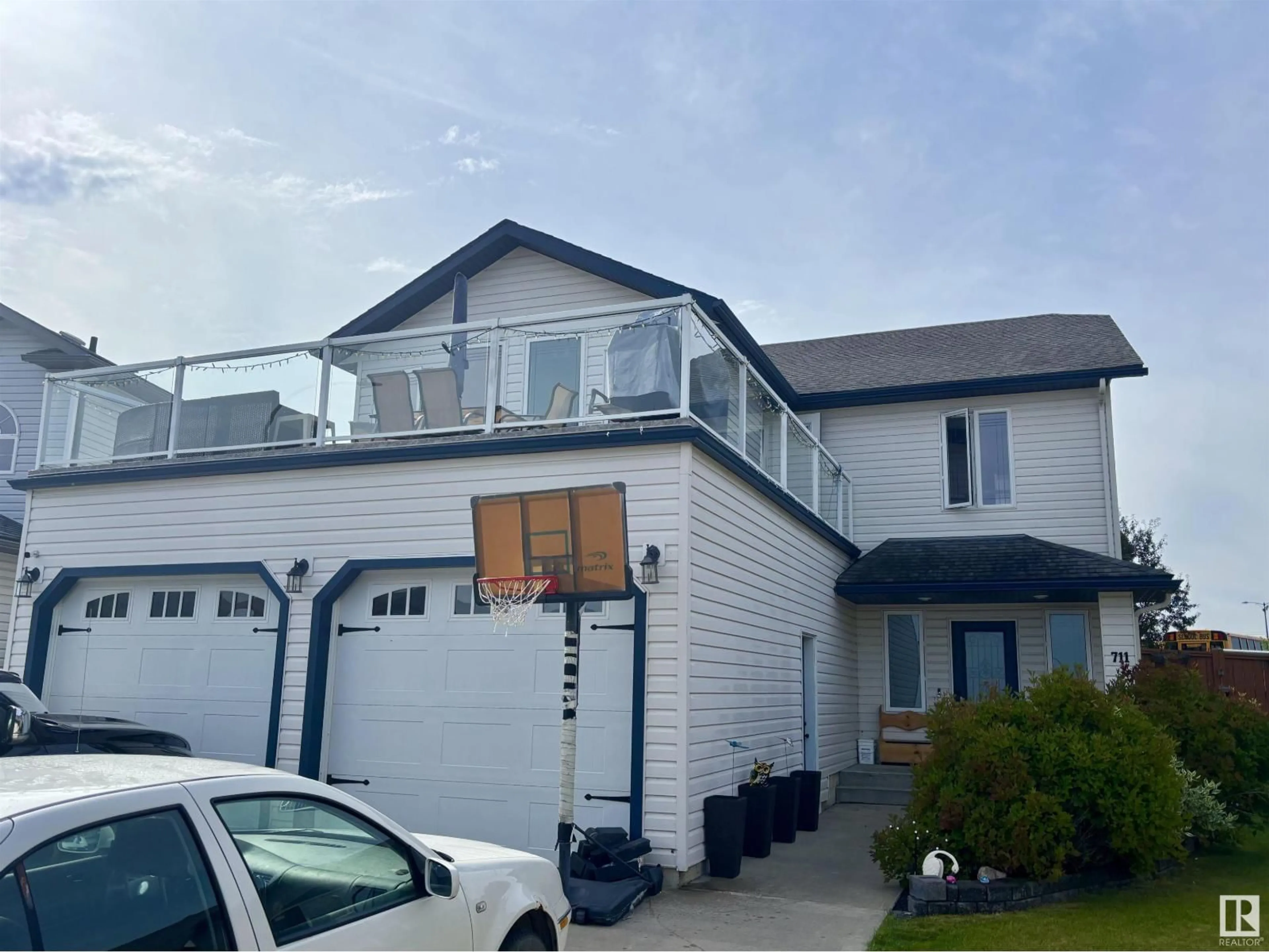 Home with vinyl exterior material, street for 711 GROUSE CL, Cold Lake Alberta T9M0A5