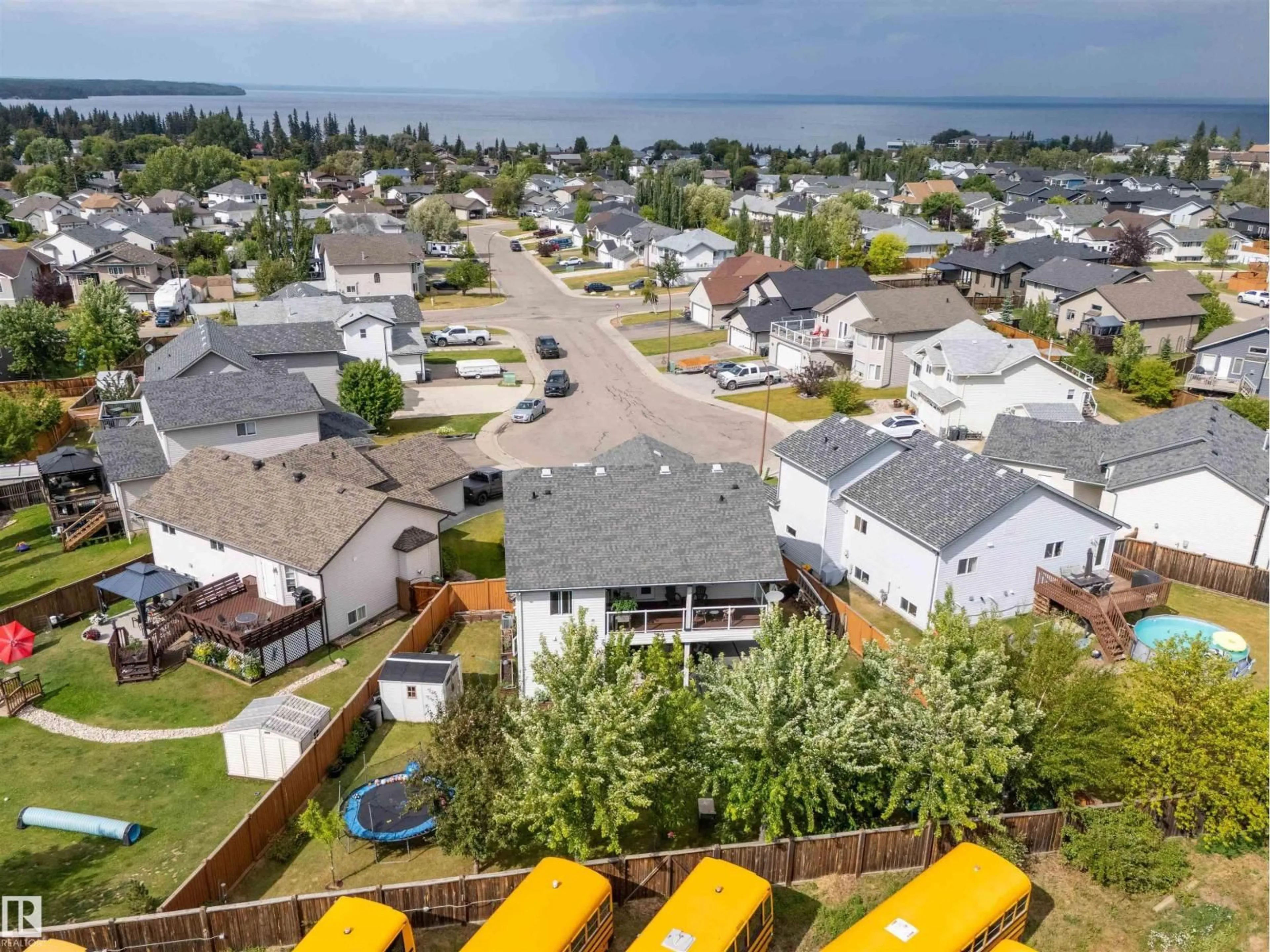 A pic from outside/outdoor area/front of a property/back of a property/a pic from drone, unknown for 711 GROUSE CL, Cold Lake Alberta T9M0A5