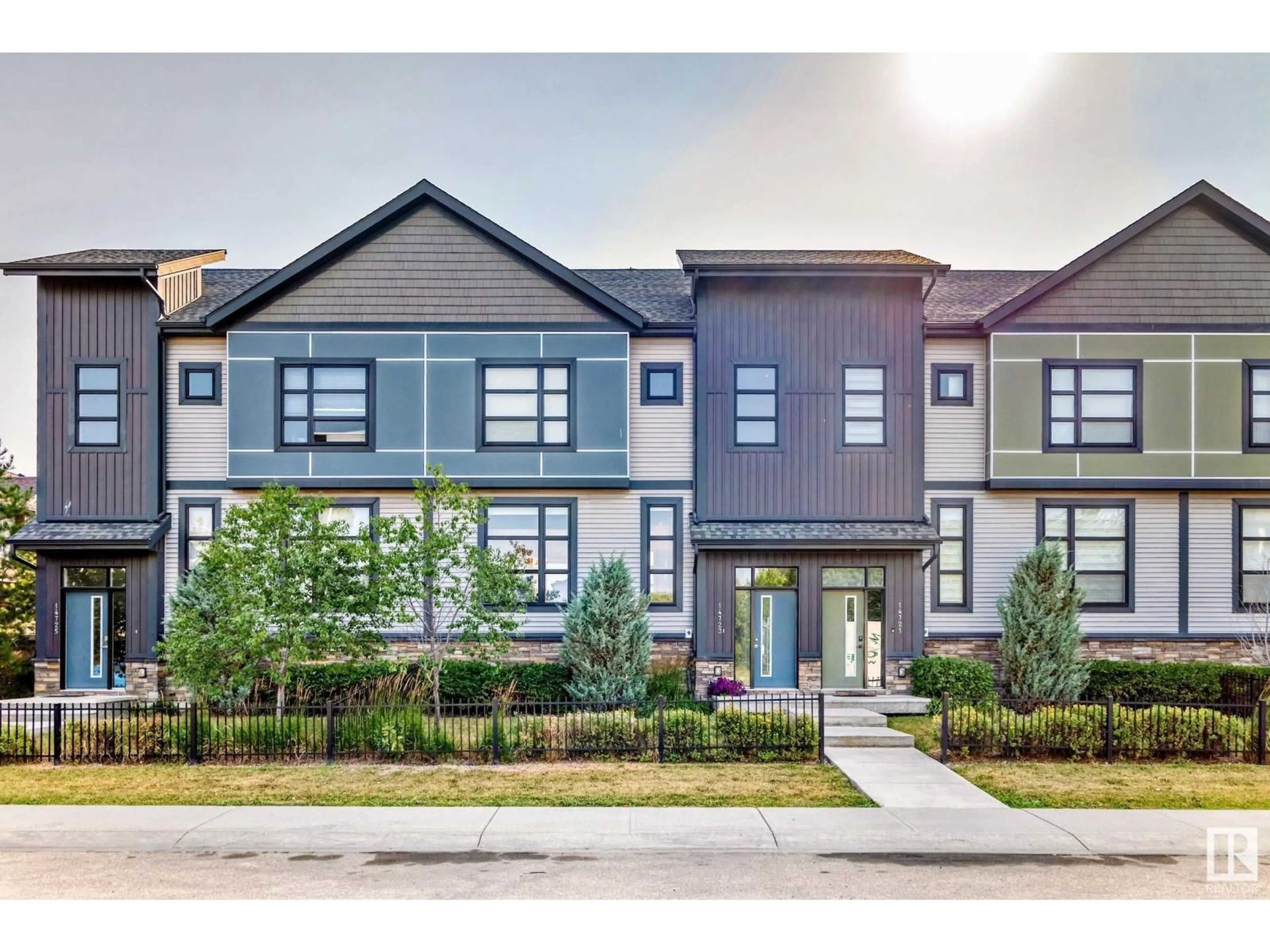 Home with vinyl exterior material, street for 14723 125 ST, Edmonton Alberta T5X0G8