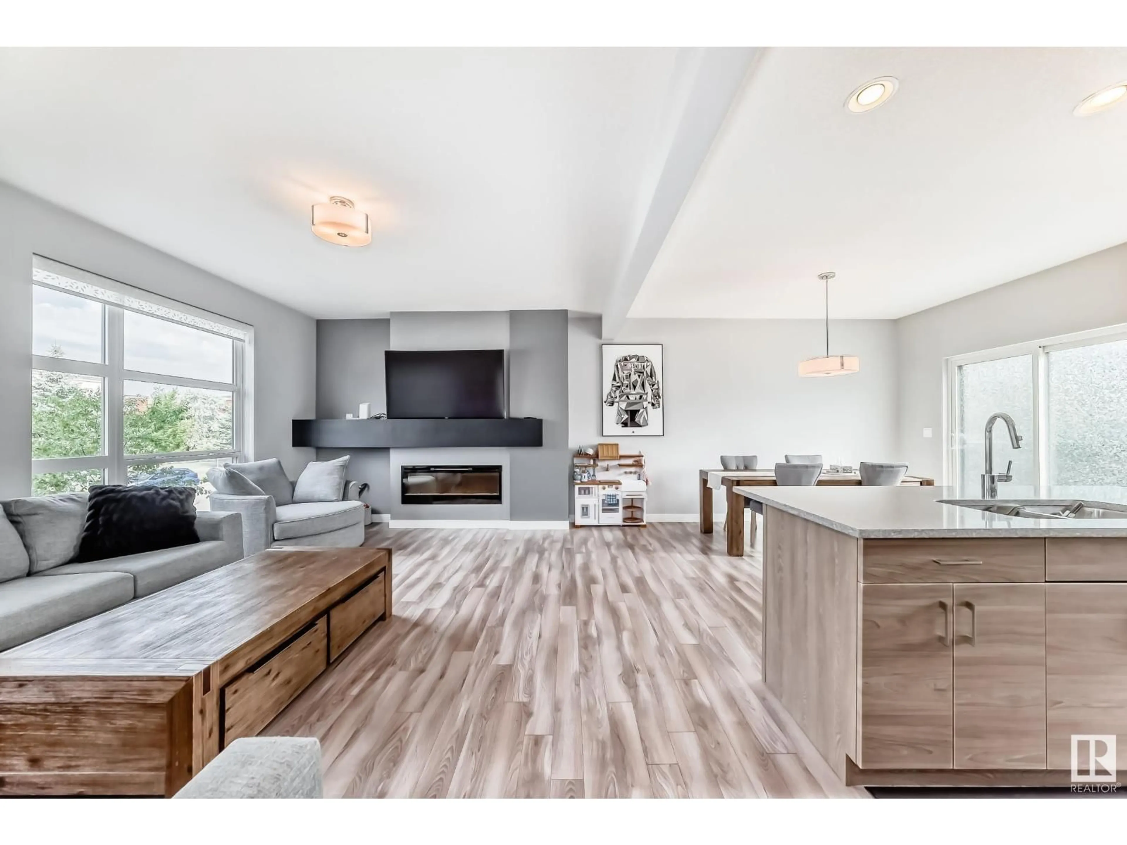 Open concept kitchen, wood/laminate floor for 14723 125 ST, Edmonton Alberta T5X0G8